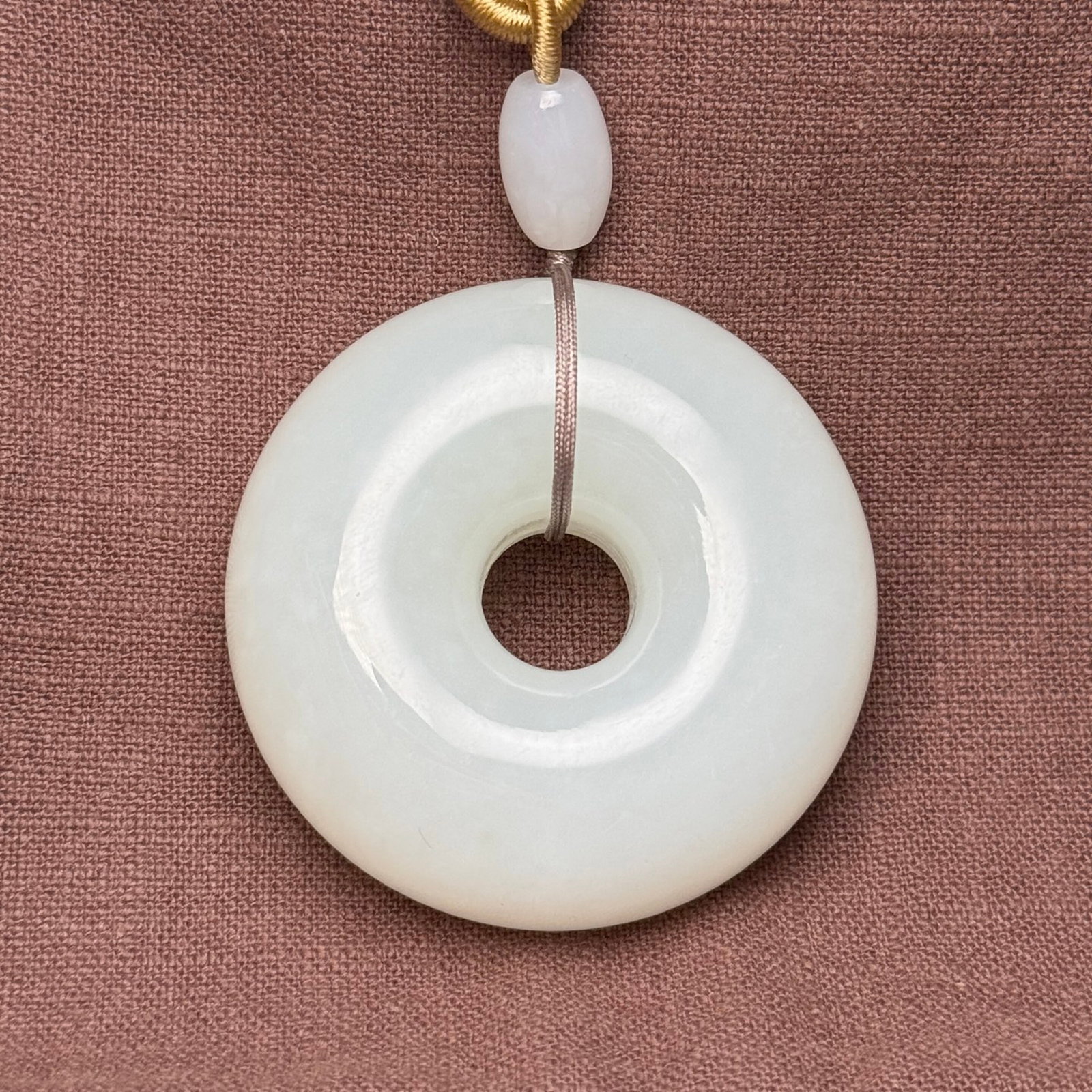 An Exquisite White Jade Pendant: An Exquisite White Jade Pendant,Qing Dynasty,China,Size:2.1inx0.8in,Weight:111g 白玉挂件,中国清代