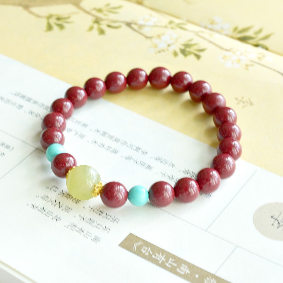 An Exquisite Cinnabar with White Jade Bracelets: An Exquisite Cinnabar with White Jade Bracelets,Size:0.3inx0.3in 朱砂配白玉手链