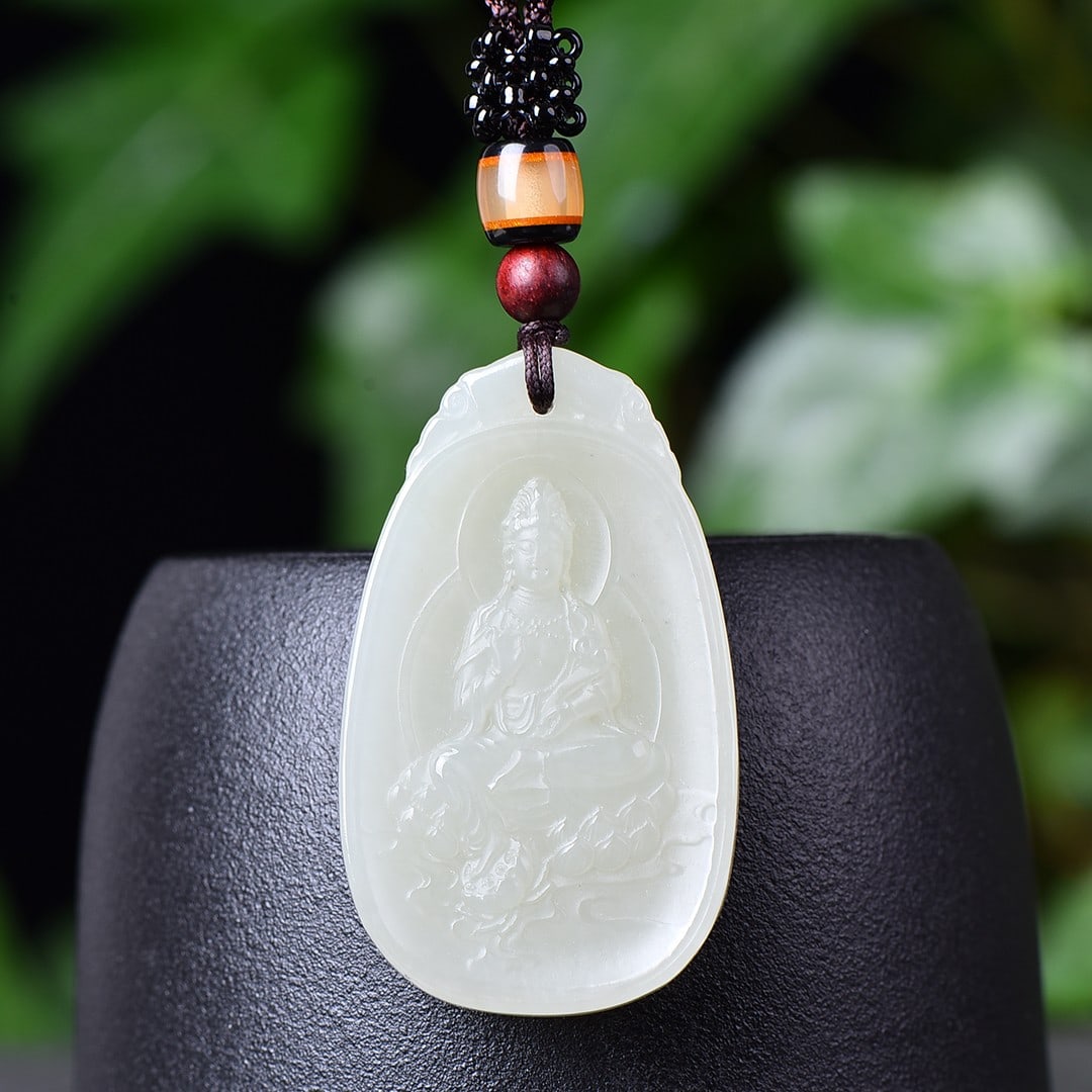 An Exquisite White Jade Statue of Avalokitesvara Pendant: An Exquisite White Jade Statue of Avalokitesvara Pendant,Size:0.9inx1.9in 白玉观音像挂件