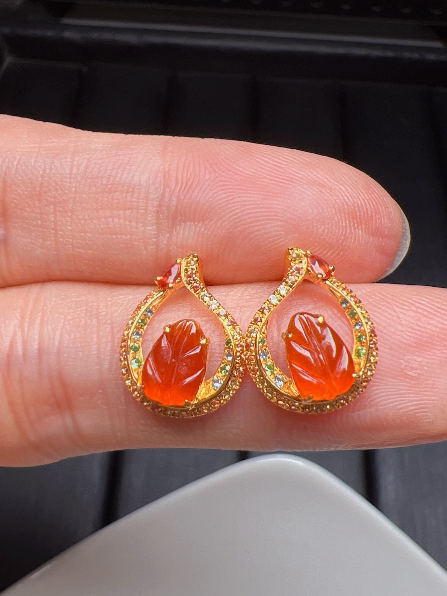 A Pair of Exquisite 18k Gold Diamond Inlaid Jadeite Earrings: A Pair of Exquisite 18k Gold Diamond Inlaid Jadeite Earrings,Size(Loose Stone):0.3inx0.2in 一对18k金钻镶嵌翡翠耳钉