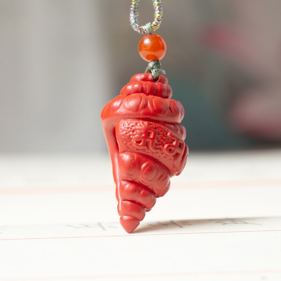 An Exquisite Cinnabar Conch Pendant: An Exquisite Cinnabar Conch Pendant,Size:0.5inx1in (寓意)吉祥招财喜庆、驱邪避凶