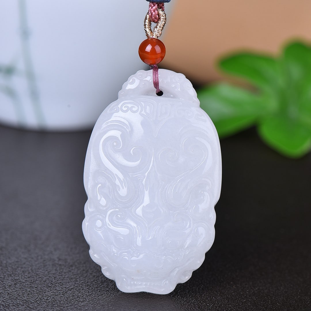 An Exquisite White Jade Beast-Face Pattern Pendant (1 of 5)