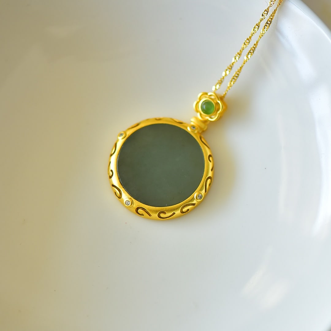 An Exquisite Sterling Silver-Gold Plated Inlaid Greenish Jade Pendant: An Exquisite Sterling Silver-Gold Plated Inlaid Greenish Jade Pendant,Size:0.8inx0.8in 纯银镀金镶青玉吊坠