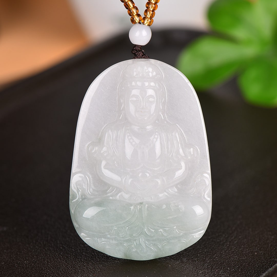 An Exquisite Jadeite Statue of Avalokitesvara Pendant: An Exquisite Jadeite Statue of Avalokitesvara Pendant,Size:1.3inx1.9in 翡翠观音挂件