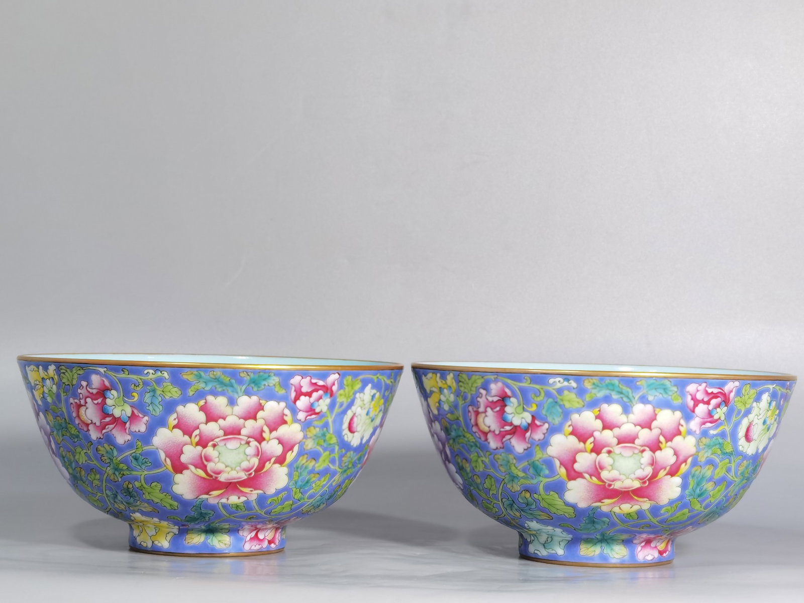 A Pair of Exquisite Blue Ground Enamel Lotus Pattern Bowls: A Pair of Exquisite Blue Ground Enamel Lotus Pattern Bowls,Qing Dynasty,China,Kangxi Four-character Mark,Size:6inx3in 一对蓝地珐琅彩缠枝莲&#