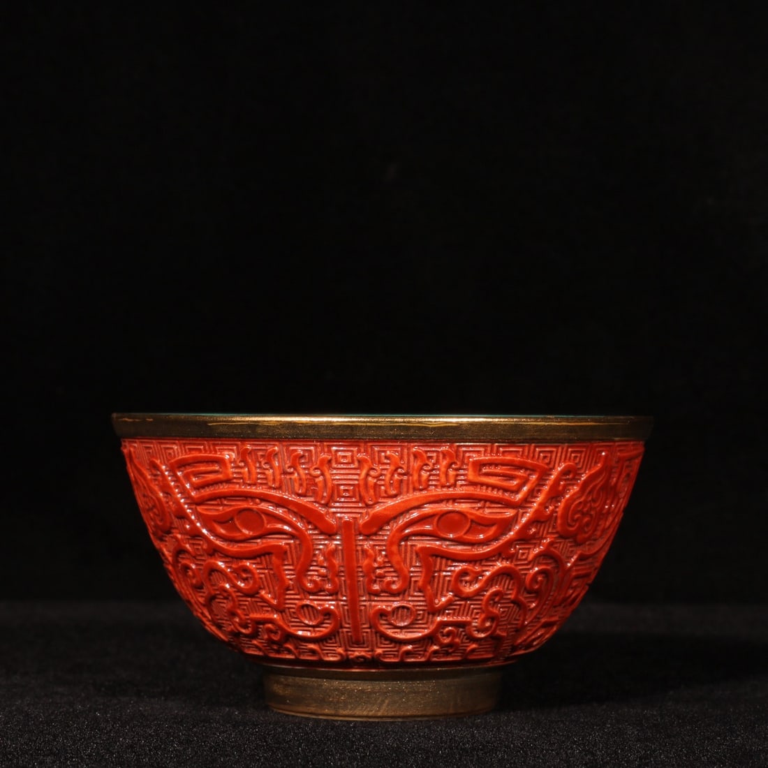 A Pair of Exquisite Coral Red Glazed Painted Gold Beast-Face Pattern Cups: A Pair of Exquisite Coral Red Glazed Painted Gold Beast-Face Pattern Cups,Qing Dynasty,China,Yongzheng Four-character Mark,Size:2inx3.5in 一对珊瑚红描金ࠦ