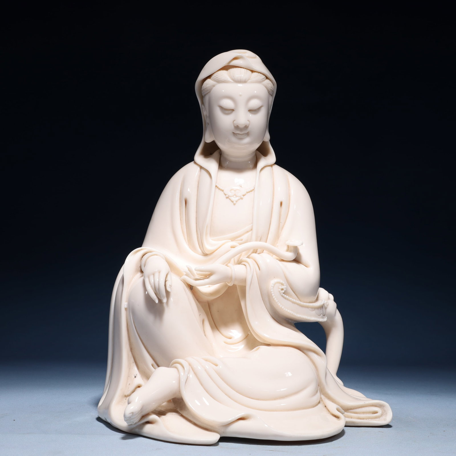 A Solemn Blance-De-Chine Statue of Avalokitesvara: A Solemn Blance-De-Chine Statue of Avalokitesvara Blance-De-Chine Statue of Avalokitesvara,Ming Dynasty,China,He Chaozong Mark,Size:8.7inx8.7inx12.2in,Weight:3750g 德化瓷观&