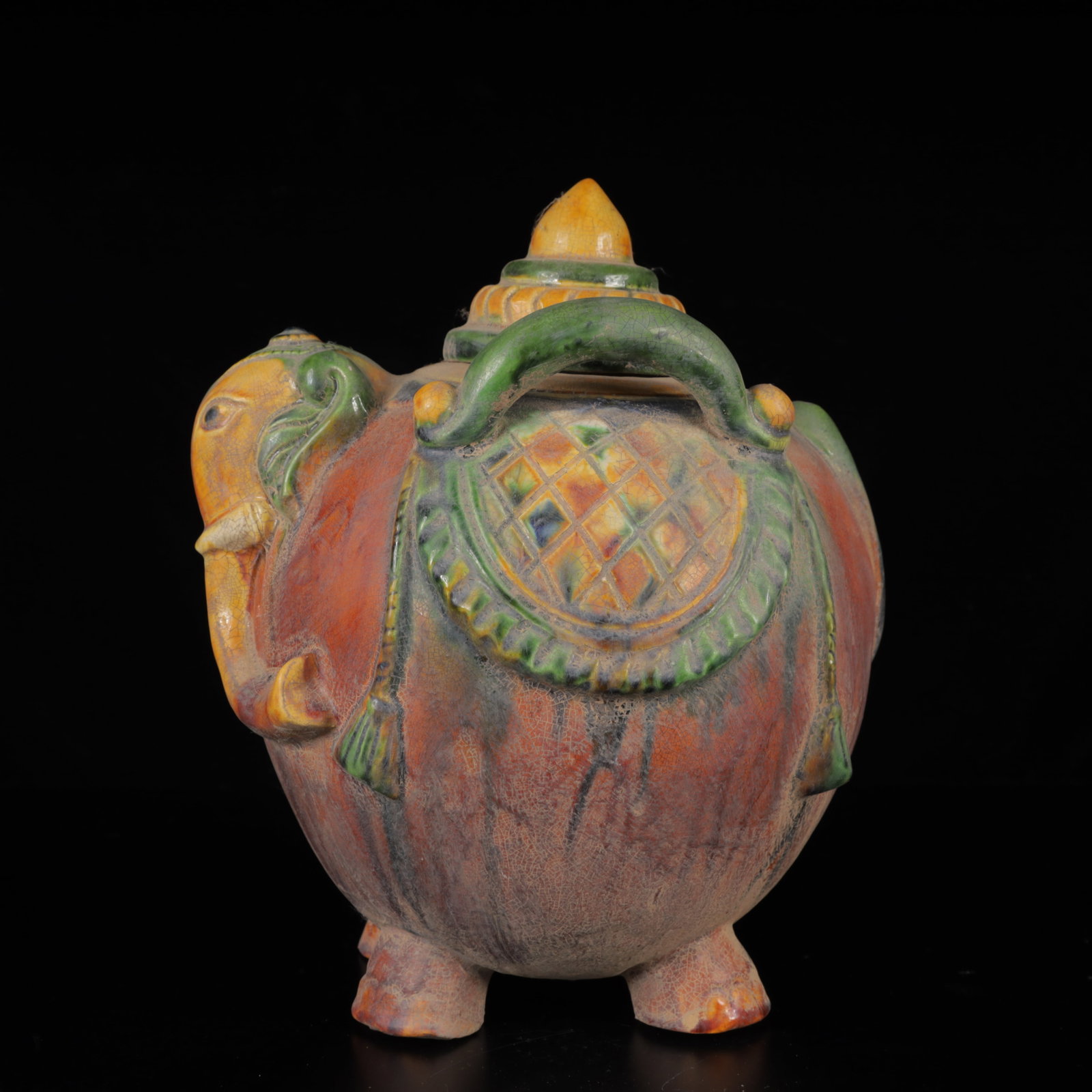 An Exquisite Tang Tri-Color Glazed Pottery Elephant lidded jar: An Exquisite Tang Tri-Color Glazed Pottery Elephant lidded jar,Tang Dynasty,China,Size:9.1inx6.3inx5.9in,Weight:1050g 唐三彩象盖罐,中国唐代