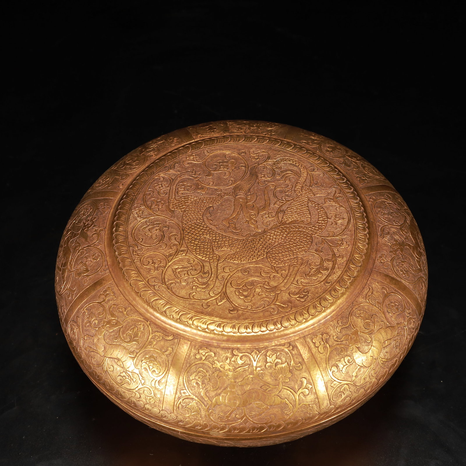 An Exquisite Gilt Bronze Flower Dragon Pattern Box with Cover: An Exquisite Gilt Bronze Flower Dragon Pattern Box with Cover,Tang Dynasty, China,Zhenguan Four-character Mark,Size:7.9inx3.9in,Weight:1200g 铜鎏金花卉龙纹