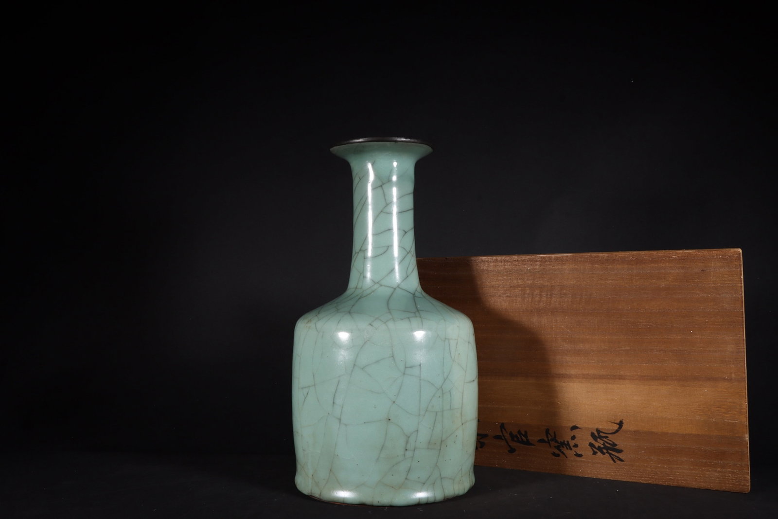 An Exquisite Guan yao Celadon Glazed Inlaid Silver Vase,with an Imperial Poem by Emperor Qianlong: An Exquisite Guan yao Celadon Glazed Inlaid Silver Vase,with an Imperial Poem by Emperor Qianlong,Song Dynasty,China,Size:10.4inx5.2in 官窑青釉镶银瓶，&