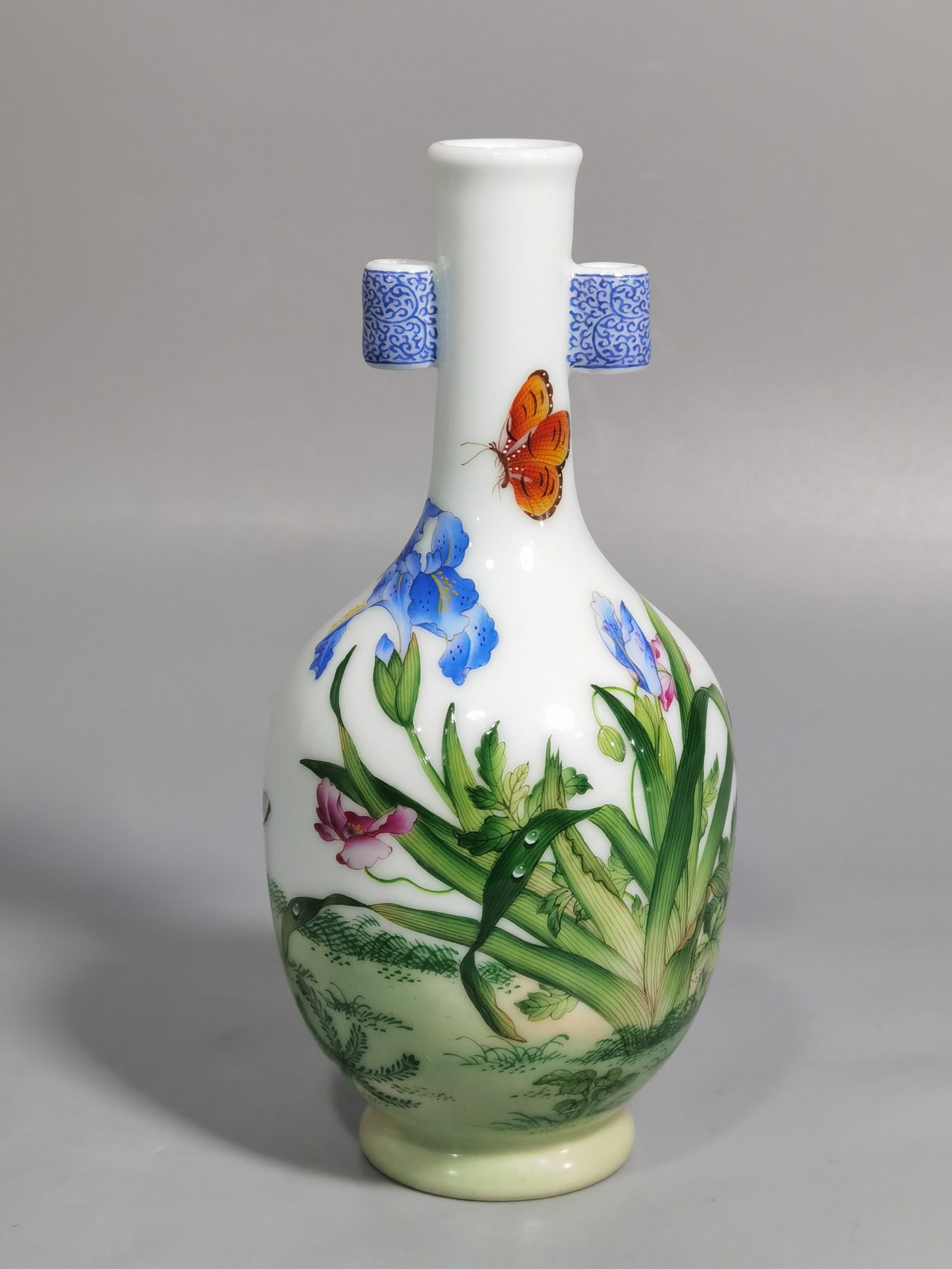 An Exquisite Enamel Flower and Butterfly Pattern Double-Ears Vase,with poem: An Exquisite Enamel Flower and Butterfly Pattern Double-Ears Vase,with poem,Qing Dynasty,China,Qianlong Four-character Mark,Size:5.8inx2.8in 珐琅彩花卉蝴蝶