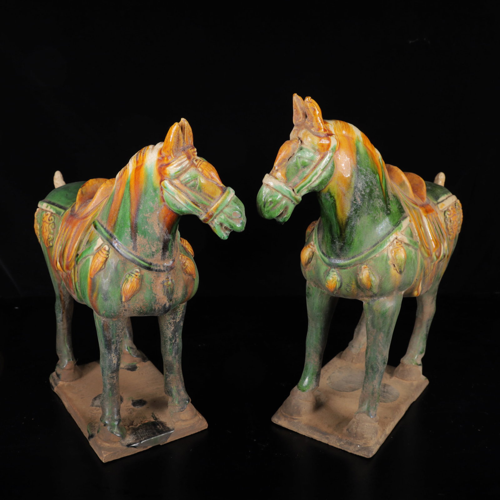 A Pair of Exquisite Tang Tri-Color Glazed Pottery Horse Ornaments: A Pair of Exquisite Tang Tri-Color Glazed Pottery Horse Ornaments,Tang Dynasty,China,Size:13inx13.4inx4.7in,Weight:4100g 一对唐三彩马摆件,中ࢲ