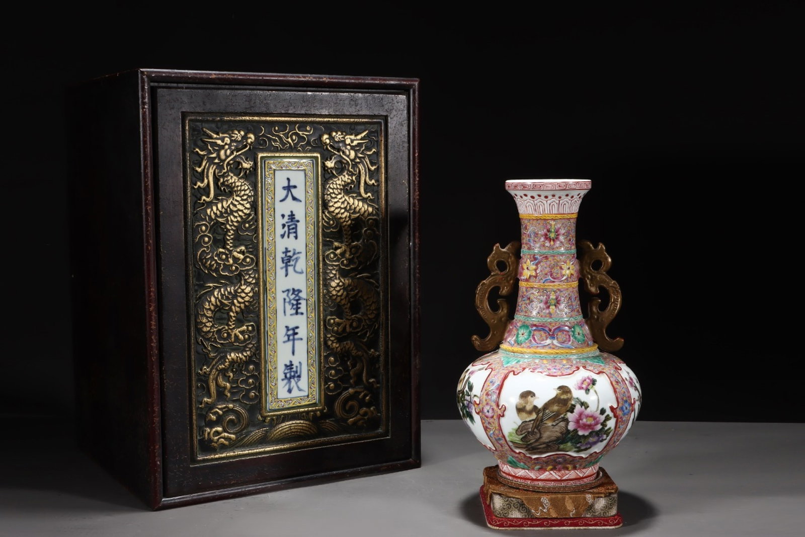 An Exquisite Famille-Rose Painted Gold Flower and Bird Pattern Double-Ears Vase: An Exquisite Famille-Rose Painted Gold Flower and Bird Pattern Double-Ears Vase,Qing Dynasty, China,Qianlong Six-character Mark,Size:11.3inx6.7in 粉彩描金花鸟ಬ