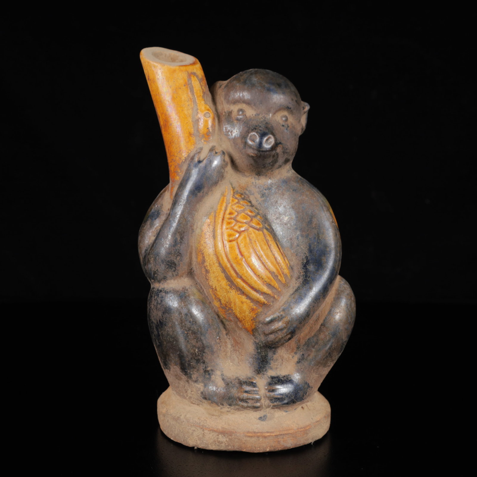 An Exquisite Tang Tri-Color Glazed Pottery Monkey teapot: An Exquisite Tang Tri-Color Glazed Pottery Monkey teapot,Tang Dynasty,China,Size:3.5inx3.1inx6.7in,Weight:360g 唐三彩猴壶,中国唐代