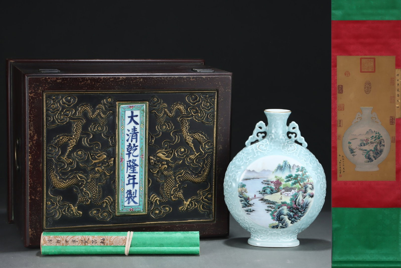 A Rare Sky Blue Glazed Famille-Rose Landscape and Figure Pattern Double-Ears Vase,with Chinese: A Rare Sky Blue Glazed Famille-Rose Landscape and Figure Pattern Double-Ears Vase,with Chinese Vertical Scroll Ink Painting on Silk,Qing Dynasty,China,Qianlong Four-character Mark,Size:(Without frame)