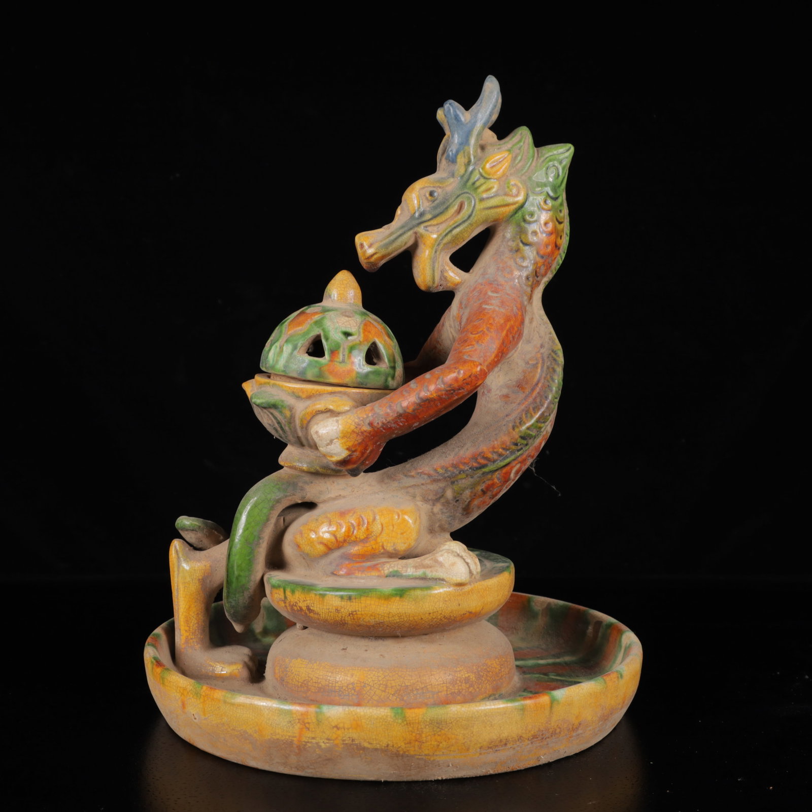 An Exquisite Tang Tri-Color Glazed Pottery Dragon Pattern Censer: An Exquisite Tang Tri-Color Glazed Pottery Dragon Pattern Censer,Tang Dynasty,China,Size:9.8inx7.9inx7.9in,Weight:1460g 唐三彩龙纹香炉,中国唐