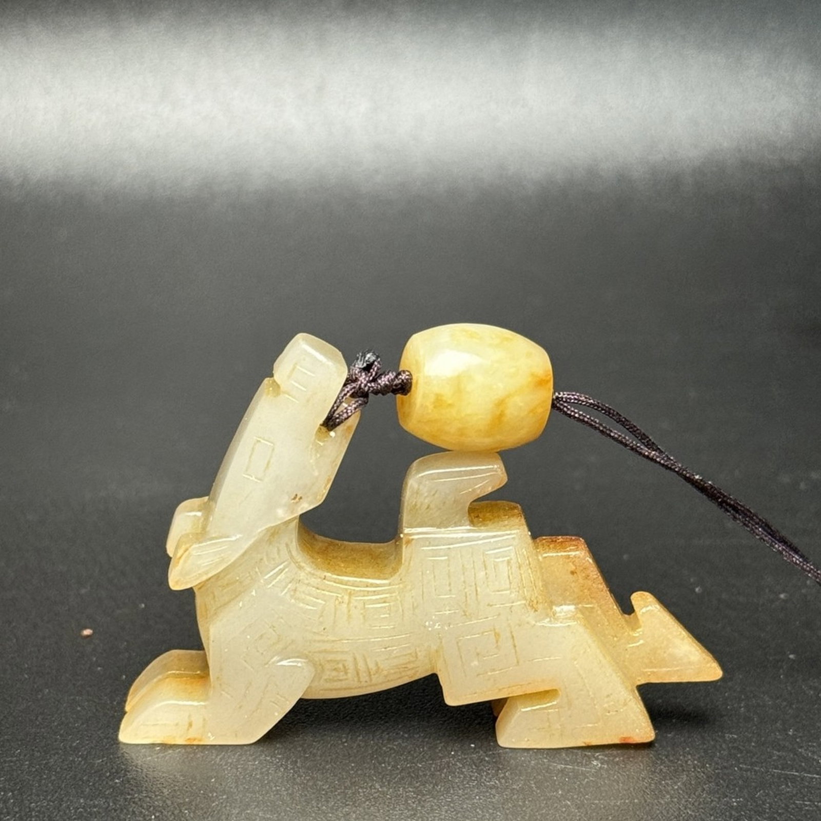 An Exquisite White Jade Dog Pendant: An Exquisite White Jade Dog Pendant,Qing Dynasty, China,Size:2.4inx1.6inx0.5in,Weight:35g 白玉狗挂件,中国清代