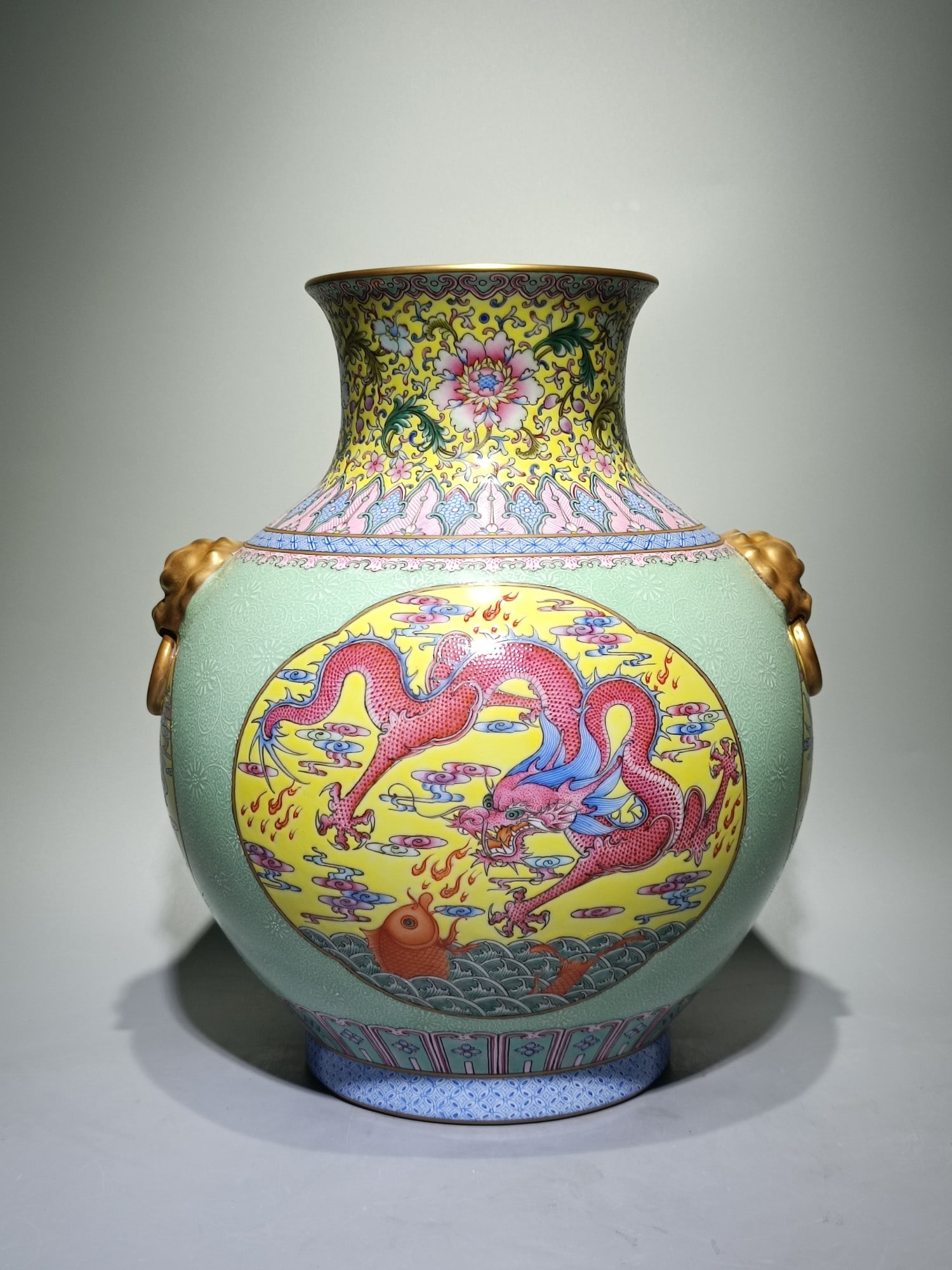 A Rare Enamel Dragon and Phoenix Pattern Lion-Ears Vase: A Rare Enamel Dragon and Phoenix Pattern Lion-Ears Vase,Qing Dynasty,China,Qianlong Four-character Mark,Size:13.4inx11.4in 珐琅彩龙凤纹狮耳瓶,