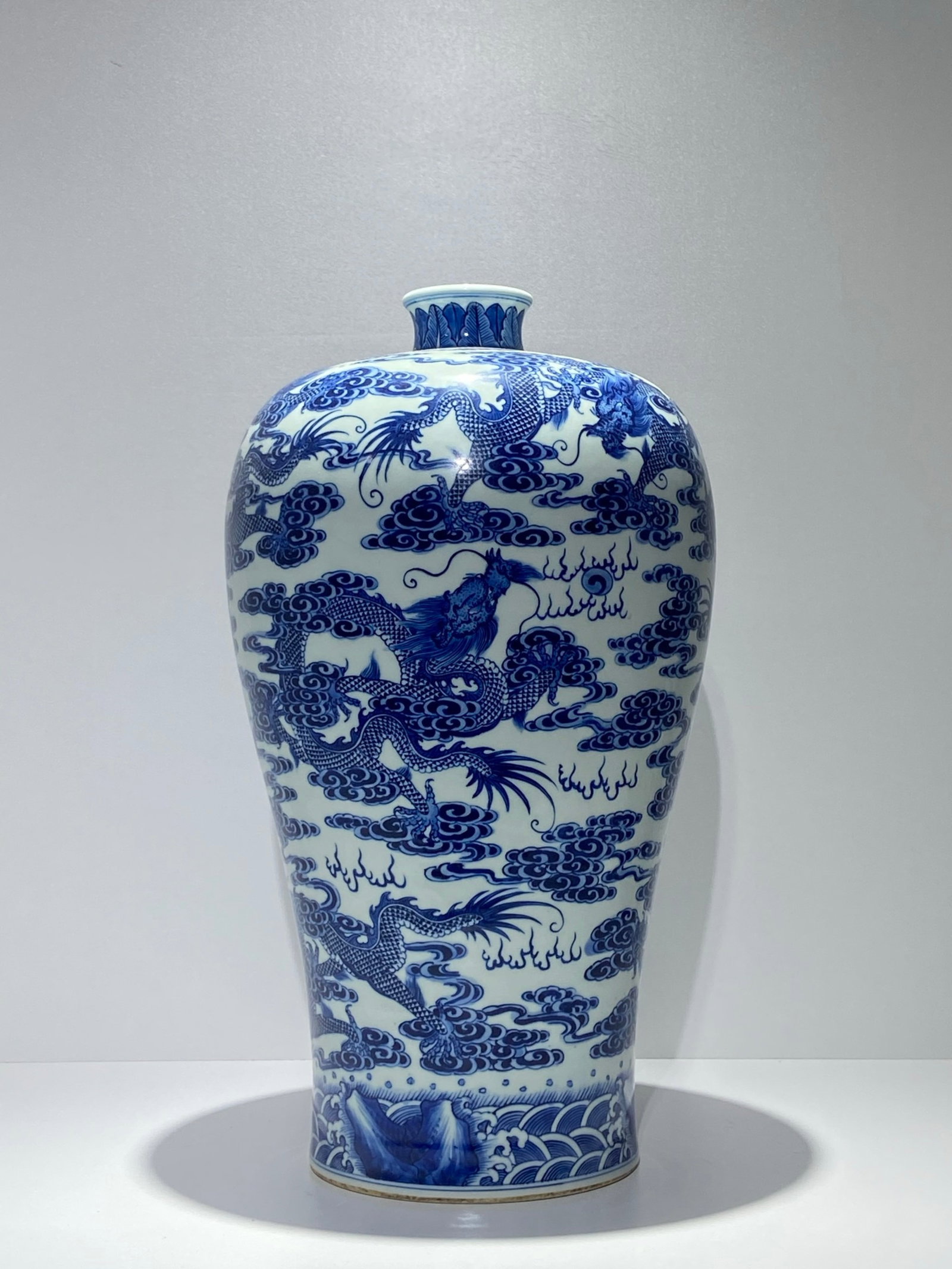 A Huge Blue and White Auspicious Cloud and Dragon Pattern Vase: A Huge Blue and White Auspicious Cloud and Dragon Pattern Vase,Qing Dynasty,China,Qianlong Six-character Mark,Size:17.3inx9.6in 青花祥云龙纹瓶,中国