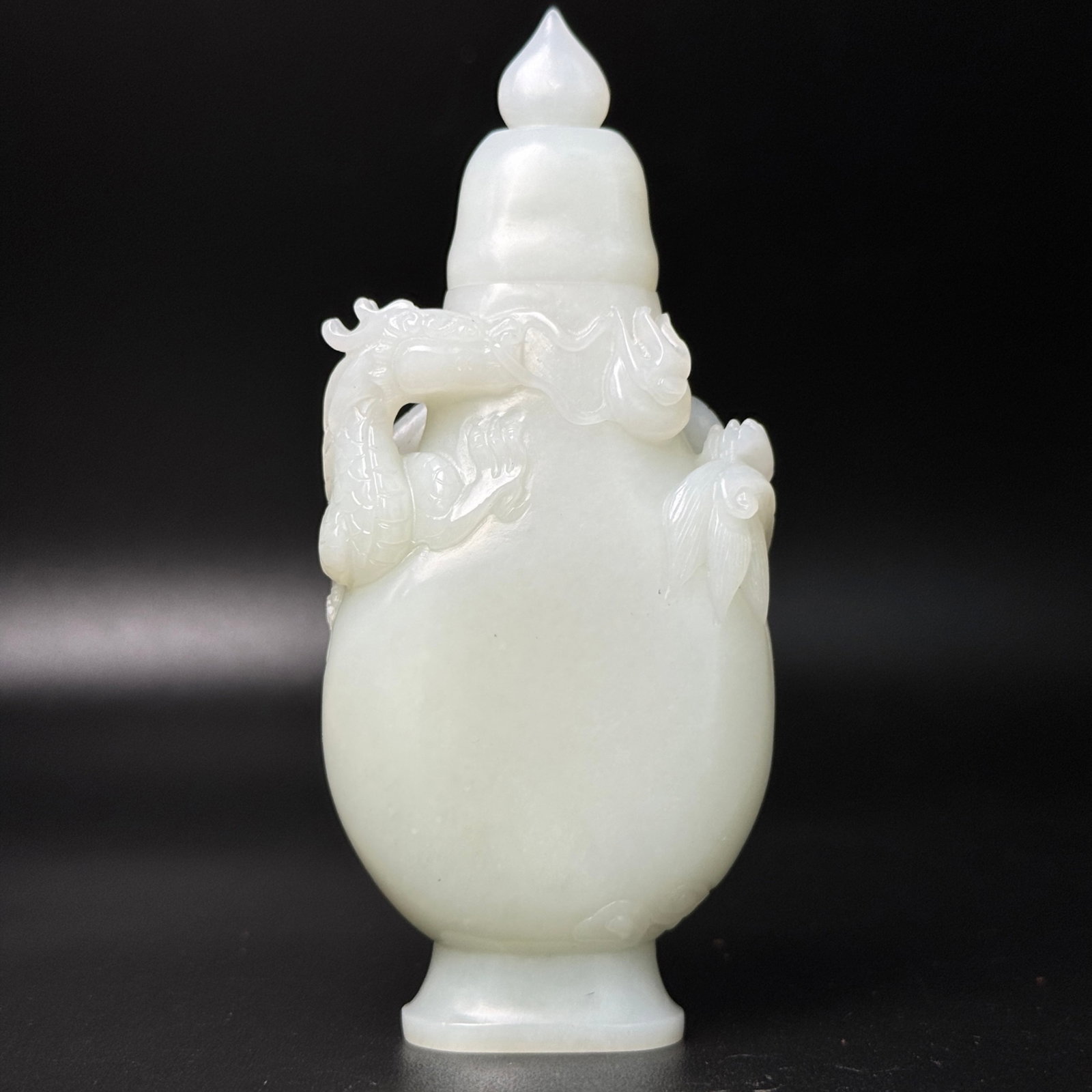 An Exquisite White Jade Dragon Pattern Bottle (1 of 7)