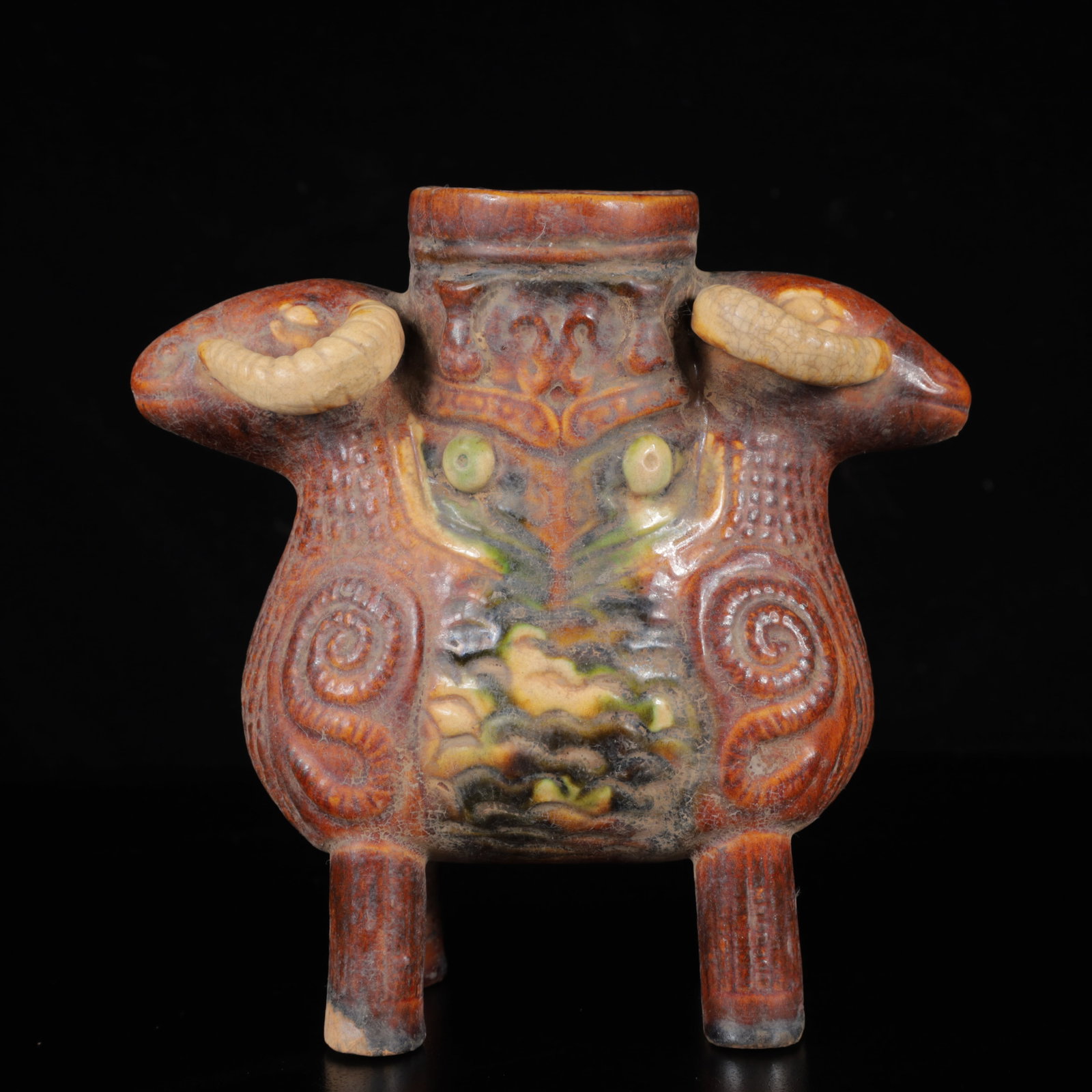 An Exquisite Tang Tri-Color Glazed Pottery Auspicious Beast Censer: An Exquisite Tang Tri-Color Glazed Pottery Auspicious Beast Censer,Tang Dynasty,China,Size:6.3inx2.8inx5.9in,Weight:420g