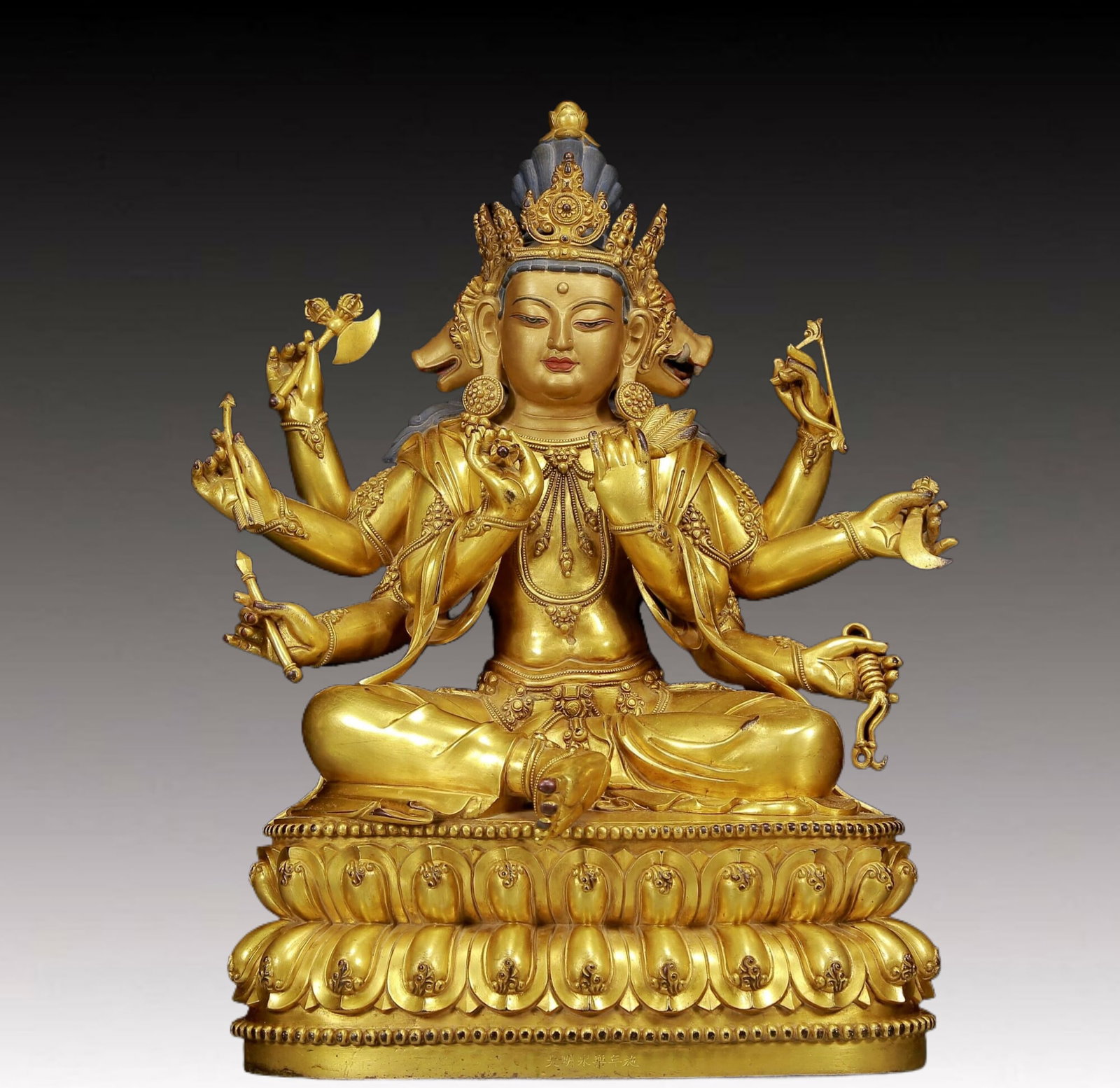 A Brilliant Gilt-Bronze Figure Of Dakini: A Brilliant Gilt-Bronze Figure Of Dakini. Seated with a peaceful expression, body adorned with jewelry ornaments, topknot surmounted by a splendid diadem, hands brandishing various ritual items. Chine