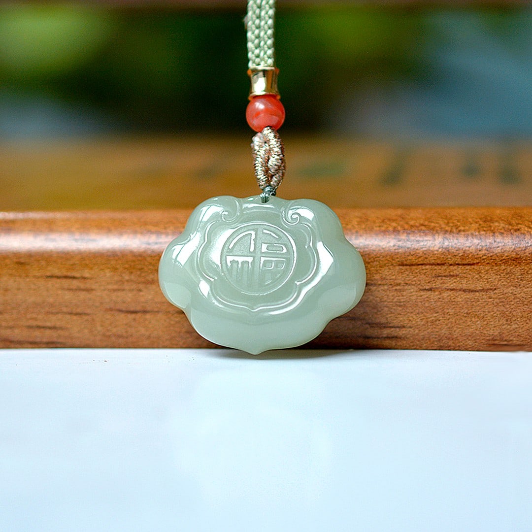 An Exquisite White Jade Dragon and Phoenix Pattern Pendant: An Exquisite White Jade Dragon and Phoenix Pattern Pendant,Size:0.9inx1.1in 白玉龙凤纹挂件
