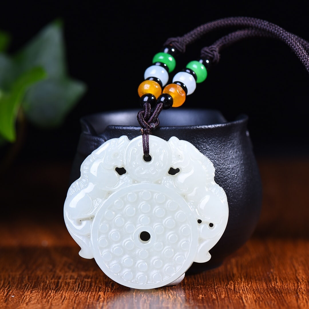 An Exquisite White Jade Wealth-Attracting Creature Pendant: An Exquisite White Jade Wealth-Attracting Creature Pendant,Size:1.9inx2in 白玉貔貅挂件