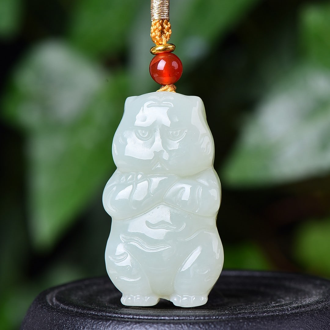 An Exquisite White Jade Tiger Pendant: An Exquisite White Jade Tiger Pendant,Size:0.9inx1.6in 白玉老虎挂件