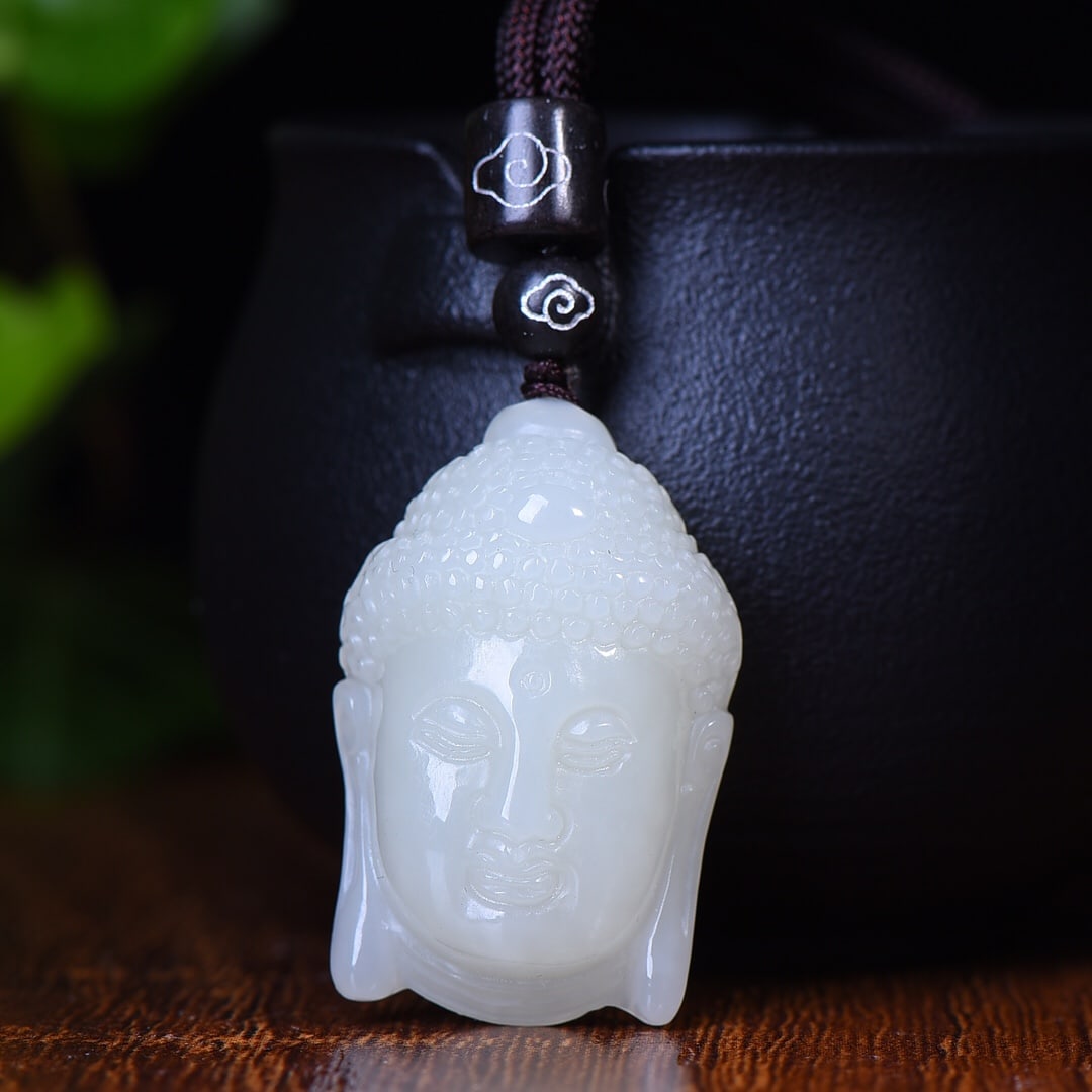 An Exquisite White Jade Buddha-head Pendant (1 of 5)