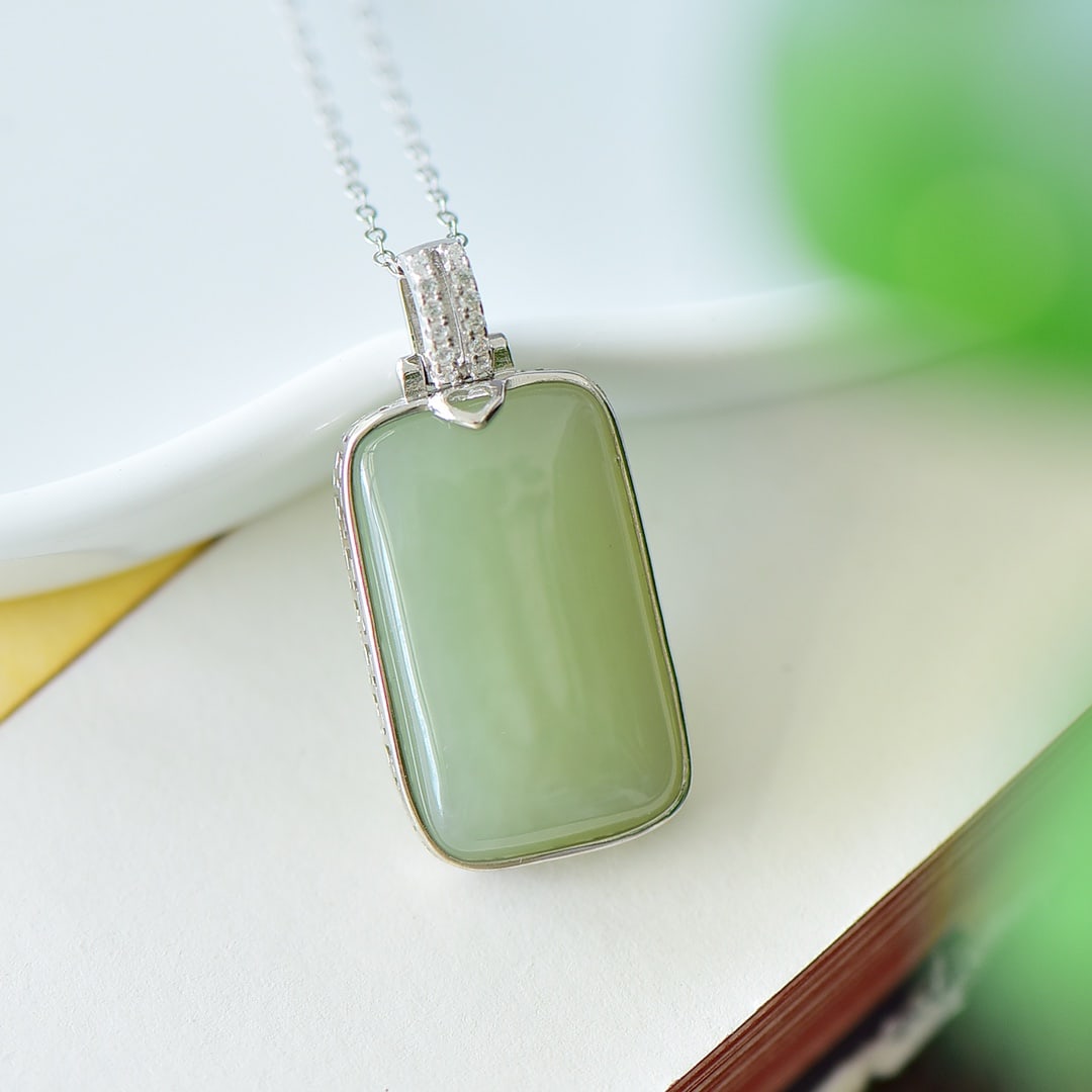 An Exquisite Sterling Silver Inlaid Greenish Jade Necklace,Inlaid Diamond: An Exquisite Sterling Silver Inlaid Greenish Jade Necklace,Inlaid Diamond,Size:0.7inx1.4in 纯银镶青玉项链,嵌钻石