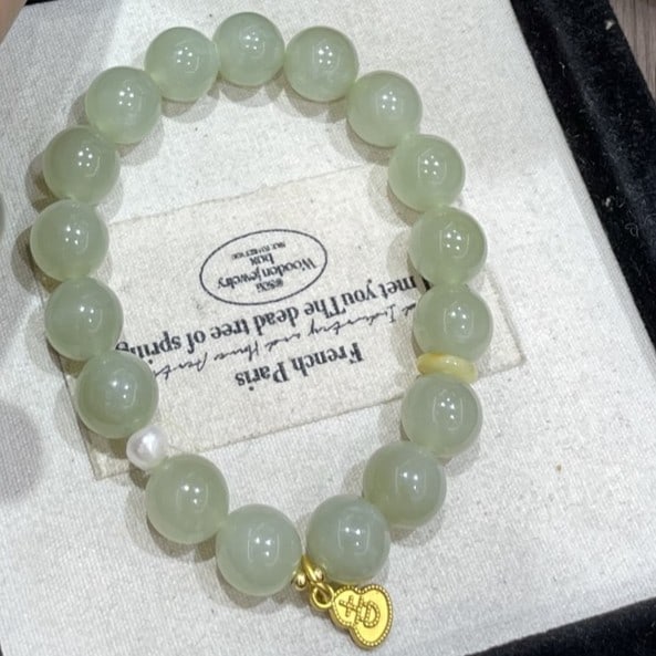 An Exquisite Greenish Jade Bracelet: An Exquisite Greenish Jade Bracelet,Size:0.4in 青玉手串