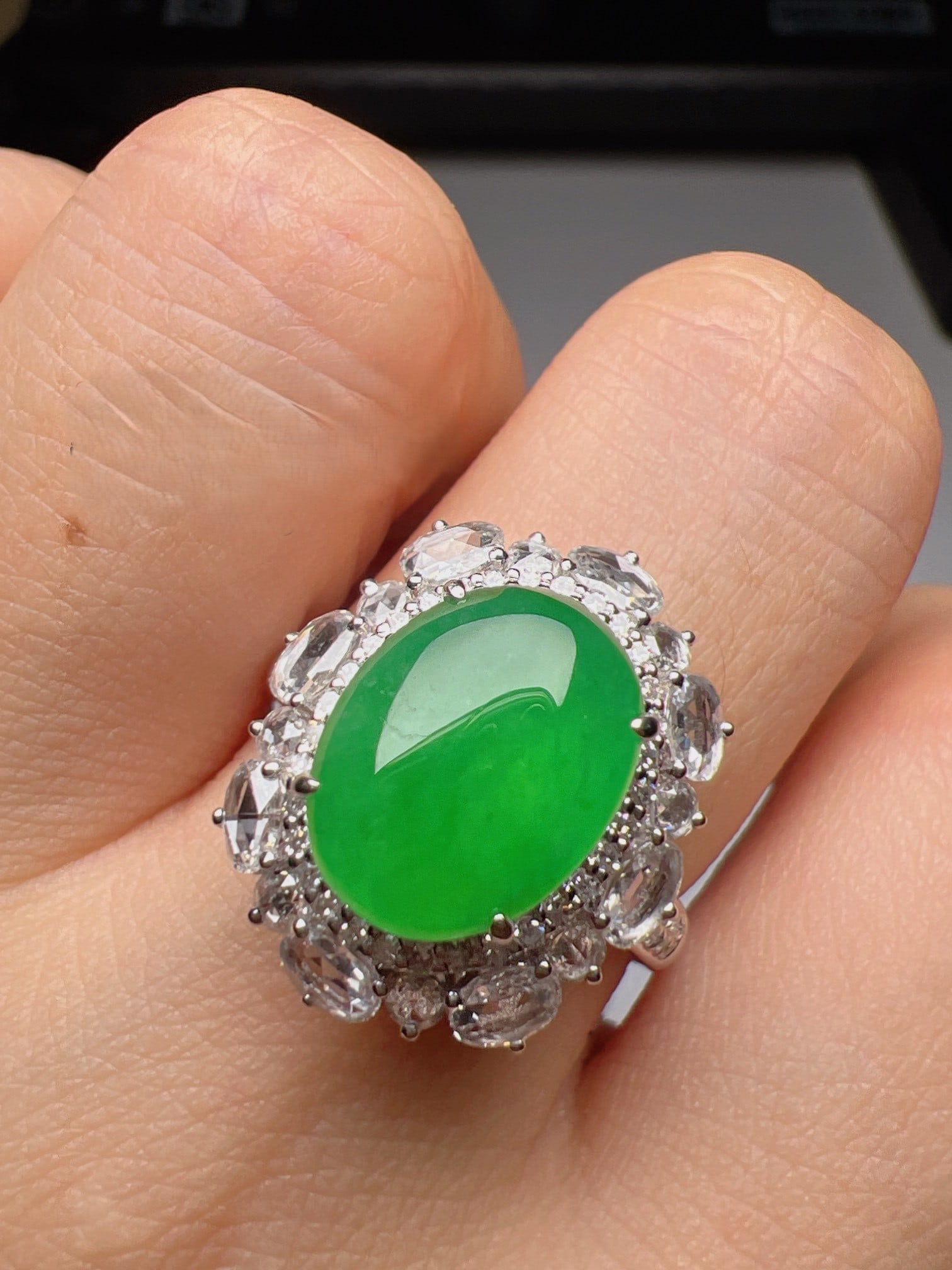 An Exquisite 18k Gold Diamond Inlaid Jadeite Ring: An Exquisite 18k Gold Diamond Inlaid Jadeite Ring,Size(Loose Stone):0.4inx0.3inx0.1in #15 18k金钻镶嵌翡翠戒指
