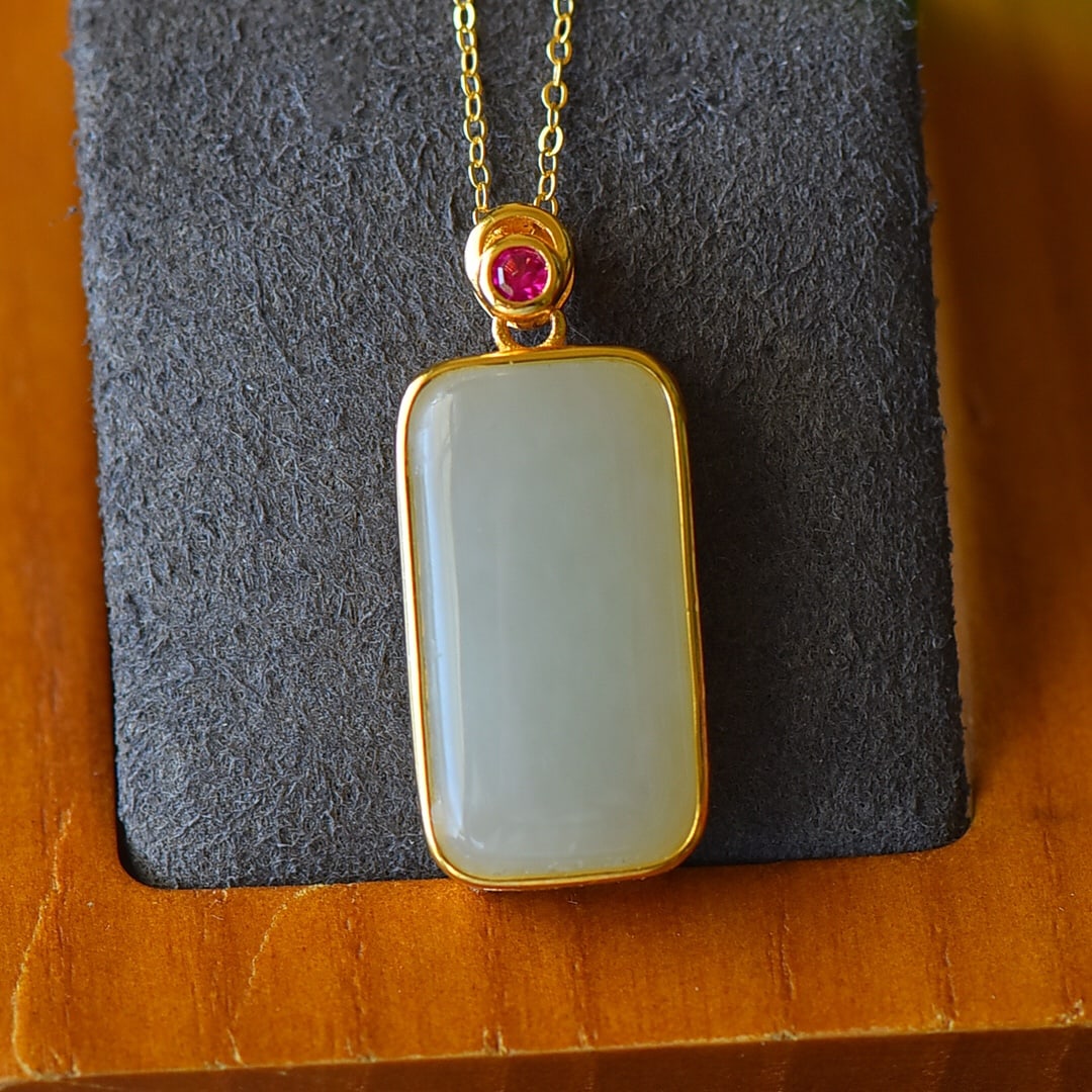 An Exquisite Sterling Silver-Gold Plated Inlaid White Jade Necklace: An Exquisite Sterling Silver-Gold Plated Inlaid White Jade Necklace,Size:0.5inx1.1in 纯银镀金镶白玉项链