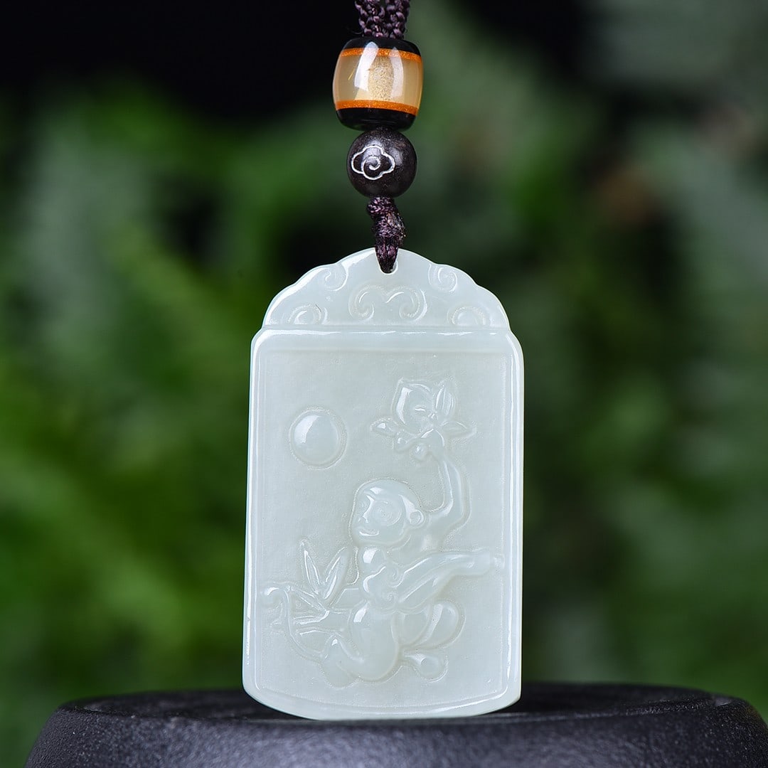 An Exquisite White Jade Monkey Pendant (1 of 5)