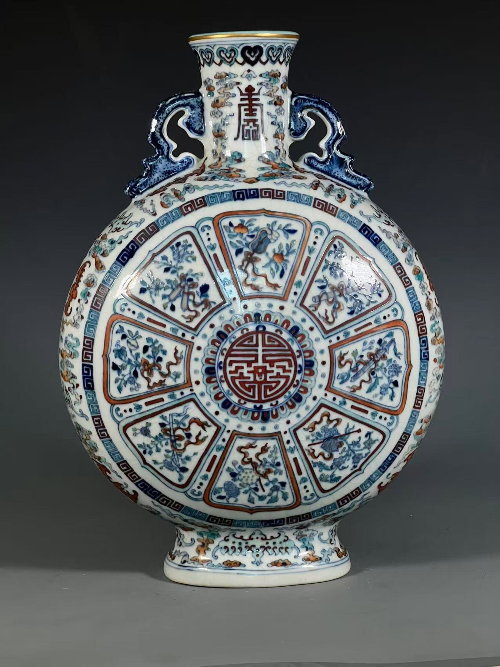 A Huge Doucai Flower and Bats Pattern Double-Ears Vase: A Huge Doucai Flower and Bats Pattern Double-Ears Vase,Qing Dynasty,China,Qianlong Six-character Mark,Size:15.7inx5.5in 斗彩花卉蝙蝠纹双耳瓶