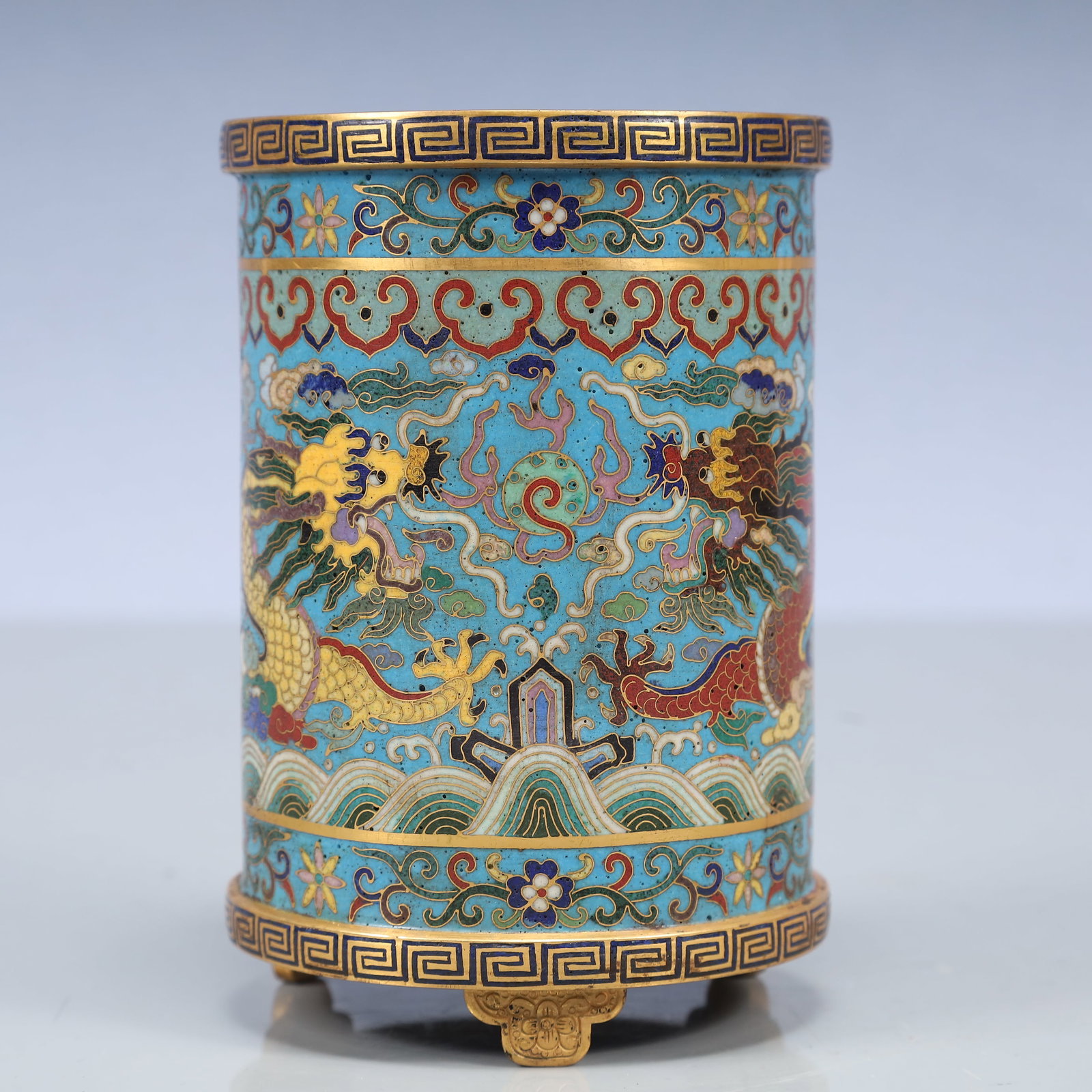 An Exquisite Cloisonne Seawater,Auspicious Cloud and Dragon Pattern Tripod Brush Pot: An Exquisite Cloisonne Seawater,Auspicious Cloud and Dragon Pattern Tripod Brush Pot,Qing Dynasty, China,Qianlong Four-character Mark,Size:3.5inx5.3in,Weight:650g 景泰蓝海ĕ