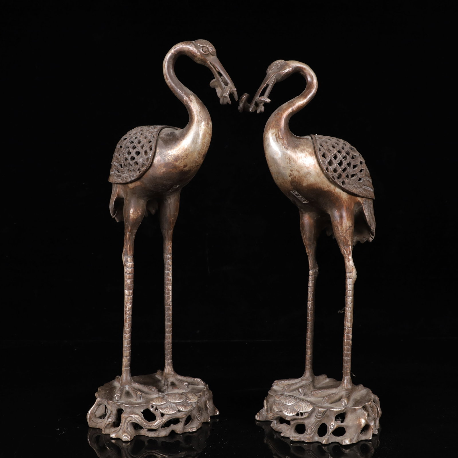 A Pair of Exquisite Silver-Plated Bronze Crane Ornaments: A Pair of Exquisite Silver-Plated Bronze Crane Ornaments,Ming Dynasty,China,Xuande Four-Character Mark,Size:7.5inx4.7inx14.6in,Weight:3050g 一对铜镀银仙鹤