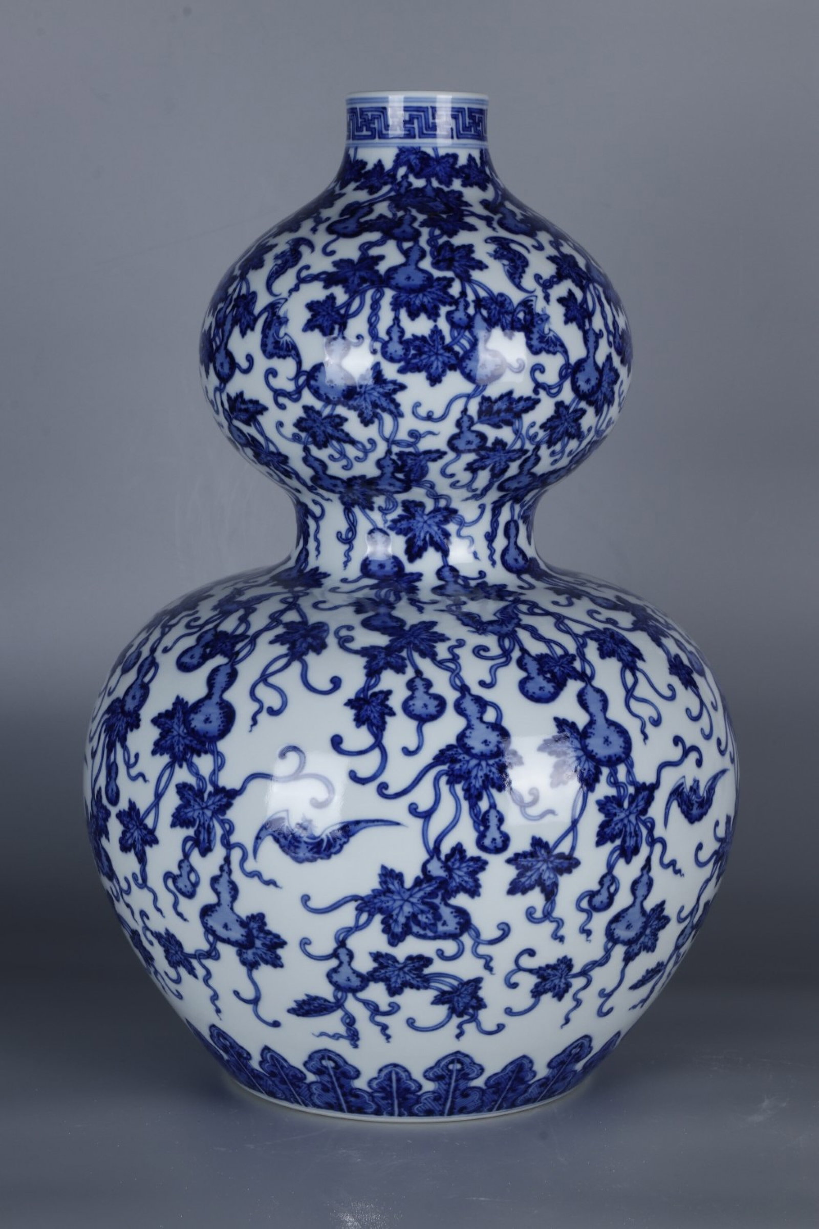 A Huge Blue and White Bats and Groud Pattern Gourd-Shaped Vase: A Huge Blue and White Bats and Groud Pattern Gourd-Shaped Vase,Qing Dynasty,China,Qianlong Six-character Mark,Size:17.5inx11.4in