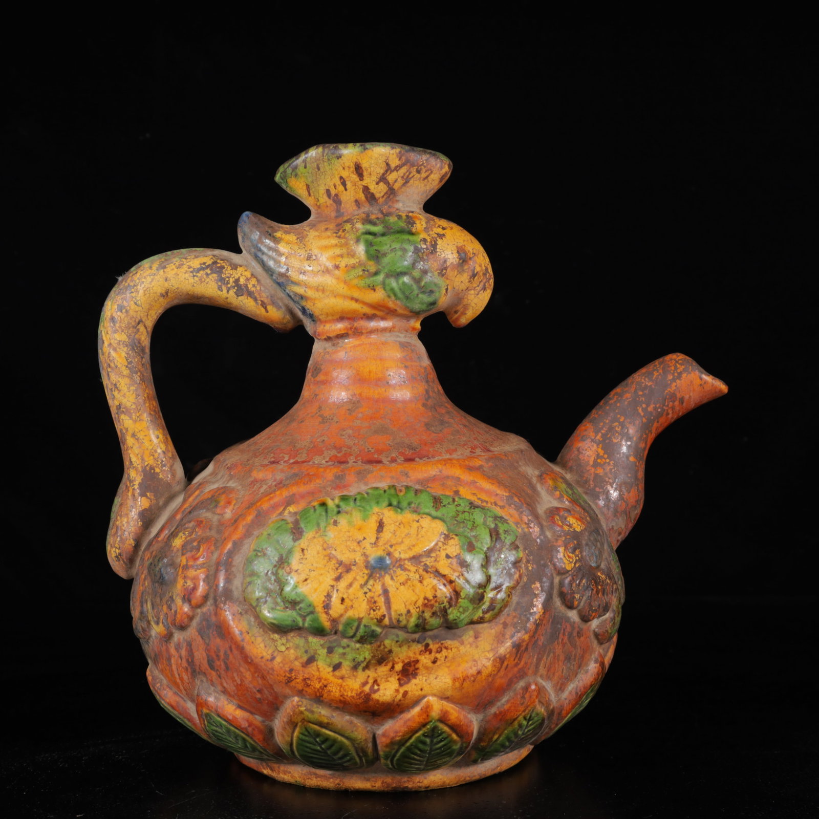 An Exquisite Tang Tri-Color Glazed Pottery Phoenix Pattern teapot: An Exquisite Tang Tri-Color Glazed Pottery Phoenix Pattern teapot,Tang Dynasty,China,Size:8.7inx6.7inx8.3in,Weight:1040g