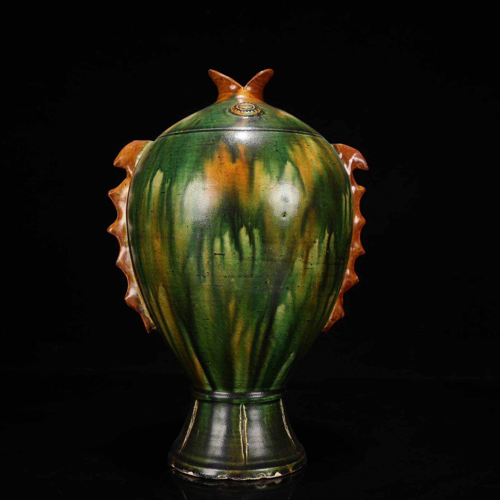 An Exquisite Tang Tri-Color Glazed Pottery Fish-Shaped Vase: An Exquisite Tang Tri-Color Glazed Pottery Fish-Shaped Vase,Tang Dynasty, China,Size:6.3inx7.5inx11in,Weight:1500g