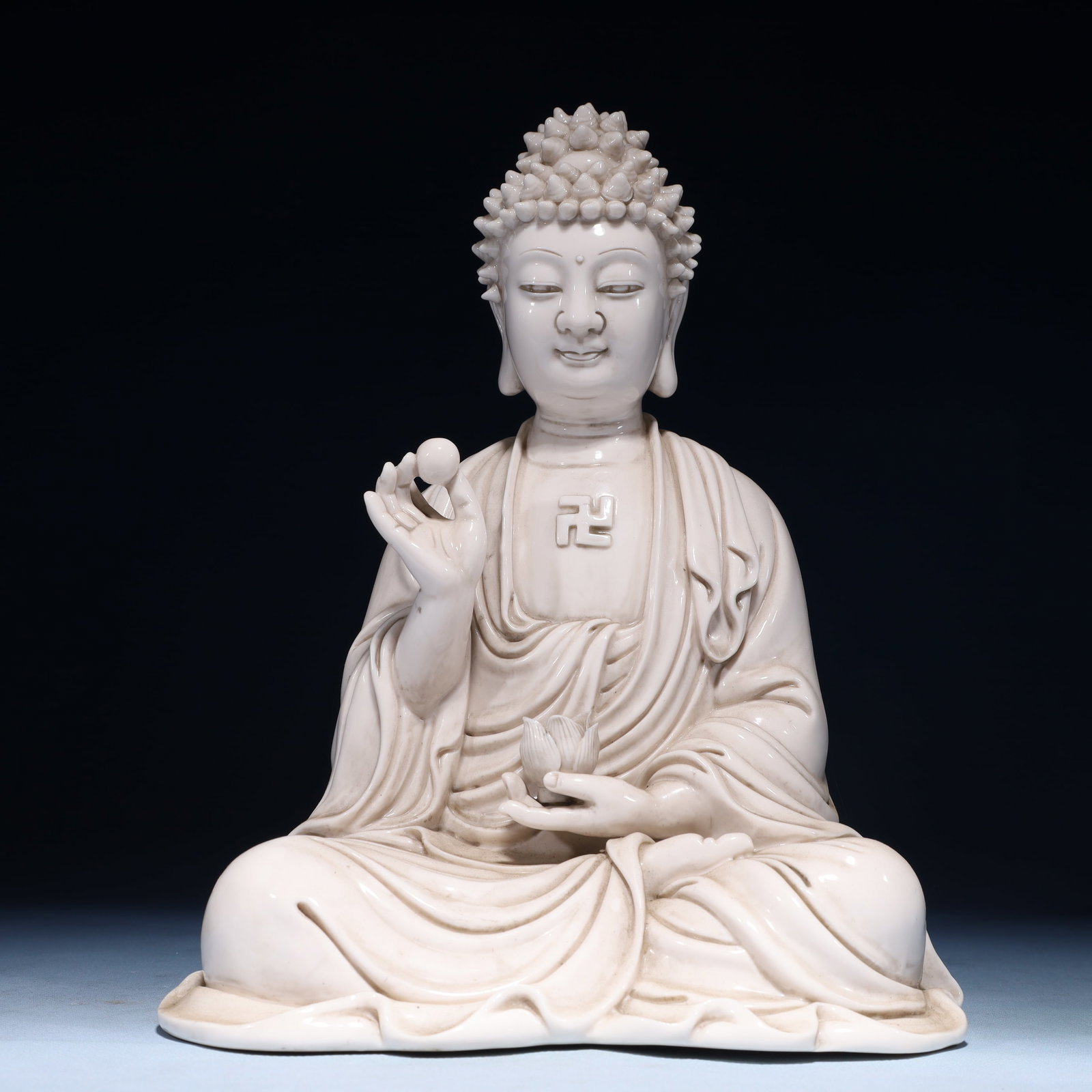 A Solemn Blance-De-Chine Statue of Sakyamuni: A Solemn Blance-De-Chine Statue of Sakyamuni Blance-De-Chine Statue of Sakyamuni,Ming Dynasty,China,He Chaozong Mark,Size:9.6inx7.1inx12.2in,Weight:3200g