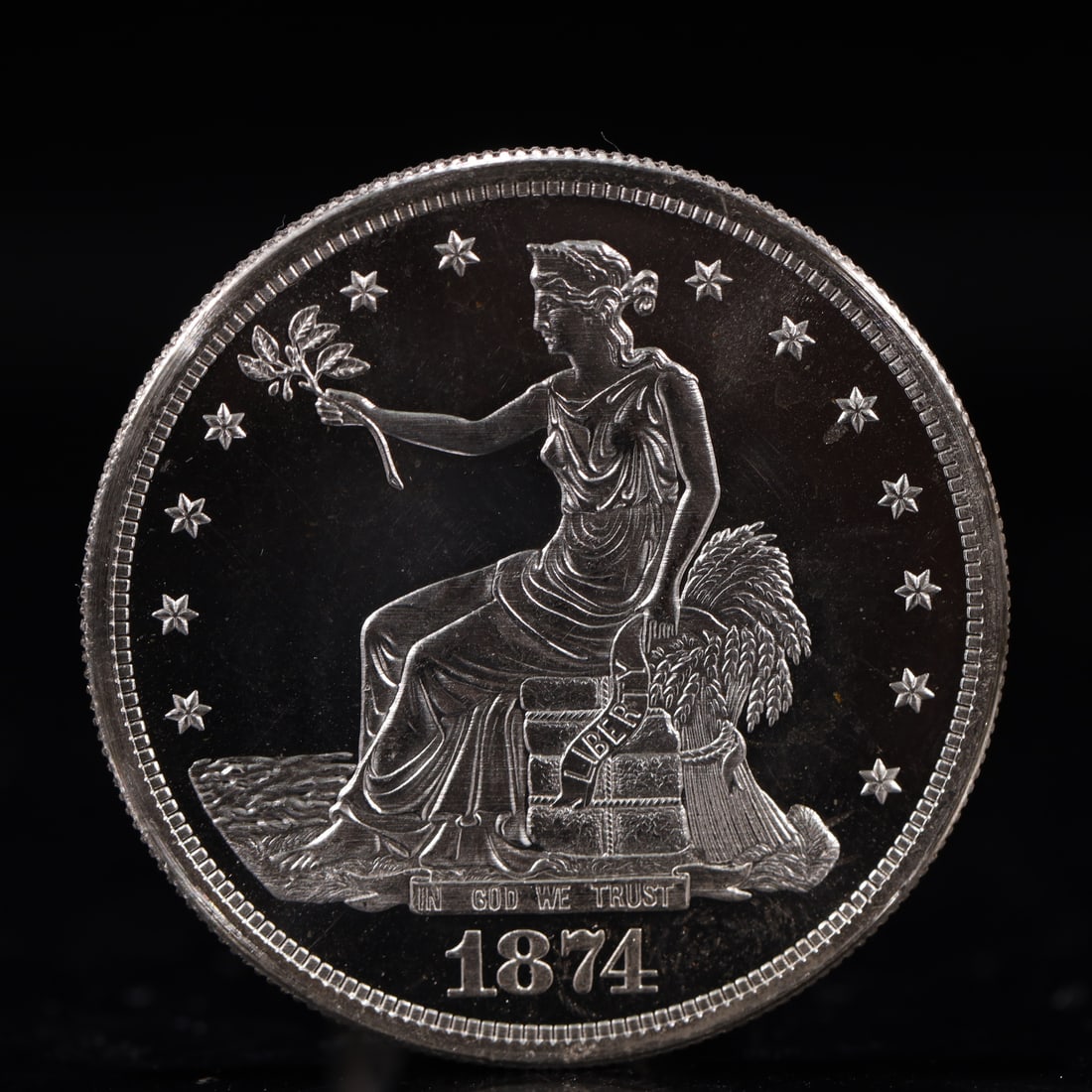 USA Trade Dollar 1874 Coin: American coin. Obverse: Liberty seated on a pedestal facing the sea to the left holding olive branches surrounded by 13 stars. IN GOD WE TRUST / LIBERTY / 1874. Reverse: An eagle holding branches with