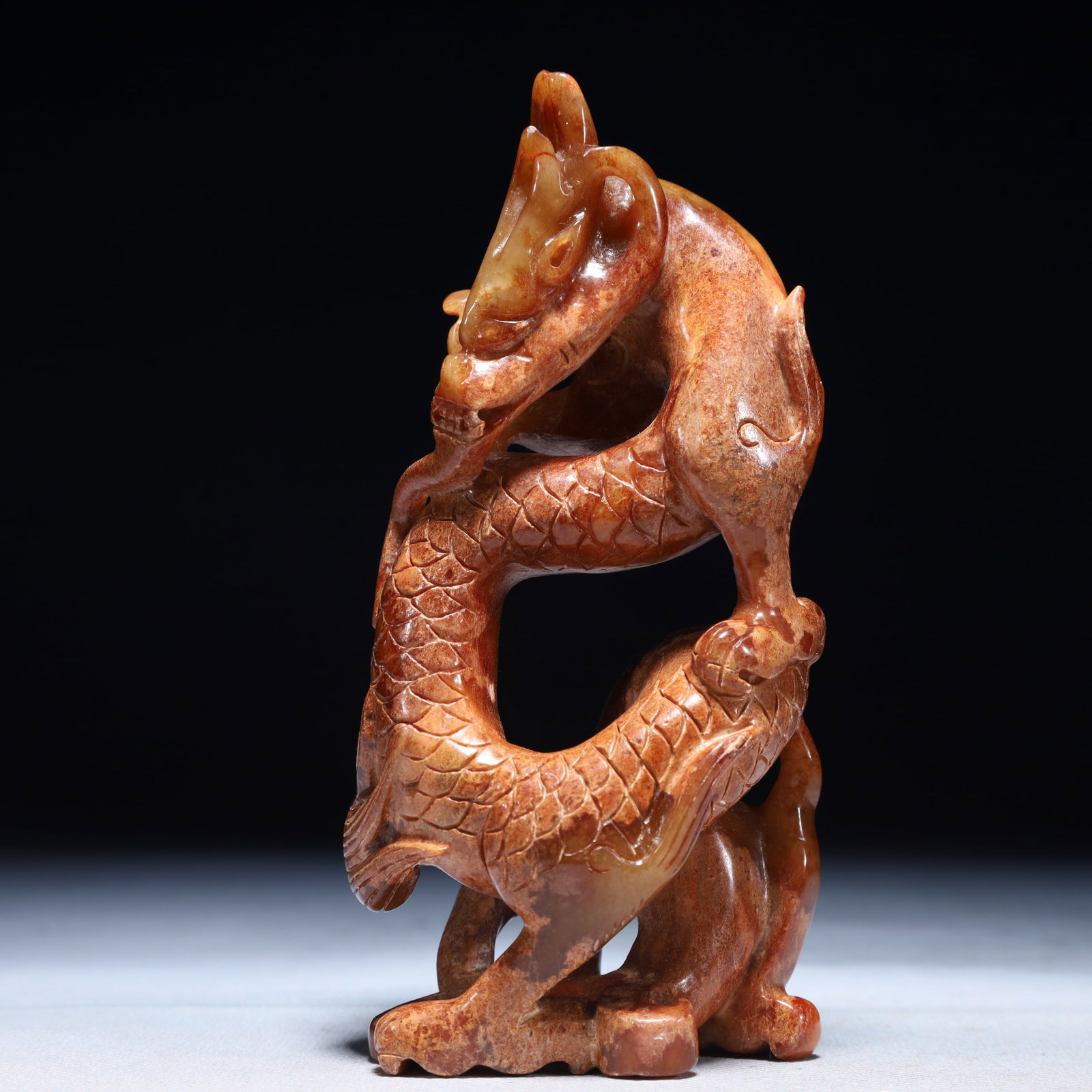 An Archaic Archaic Jade Dragon Ornament: An Archaic Archaic Jade Dragon Ornament,Ancient Time,China,Size:3.9inx3.1inx7.1in,Weight:700g 高古玉龙摆件,中国远古时期