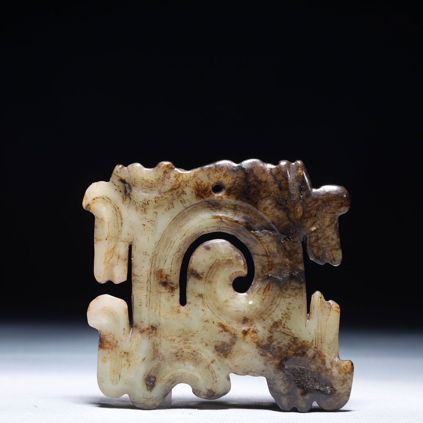 An Archaic Hongshan Culture White Jade Auspicious Cloud Pattern Pendant: An Archaic Hongshan Culture White Jade Auspicious Cloud Pattern Pendant,Ancient Time,China,Size:3inx3in,Weight:57.8g