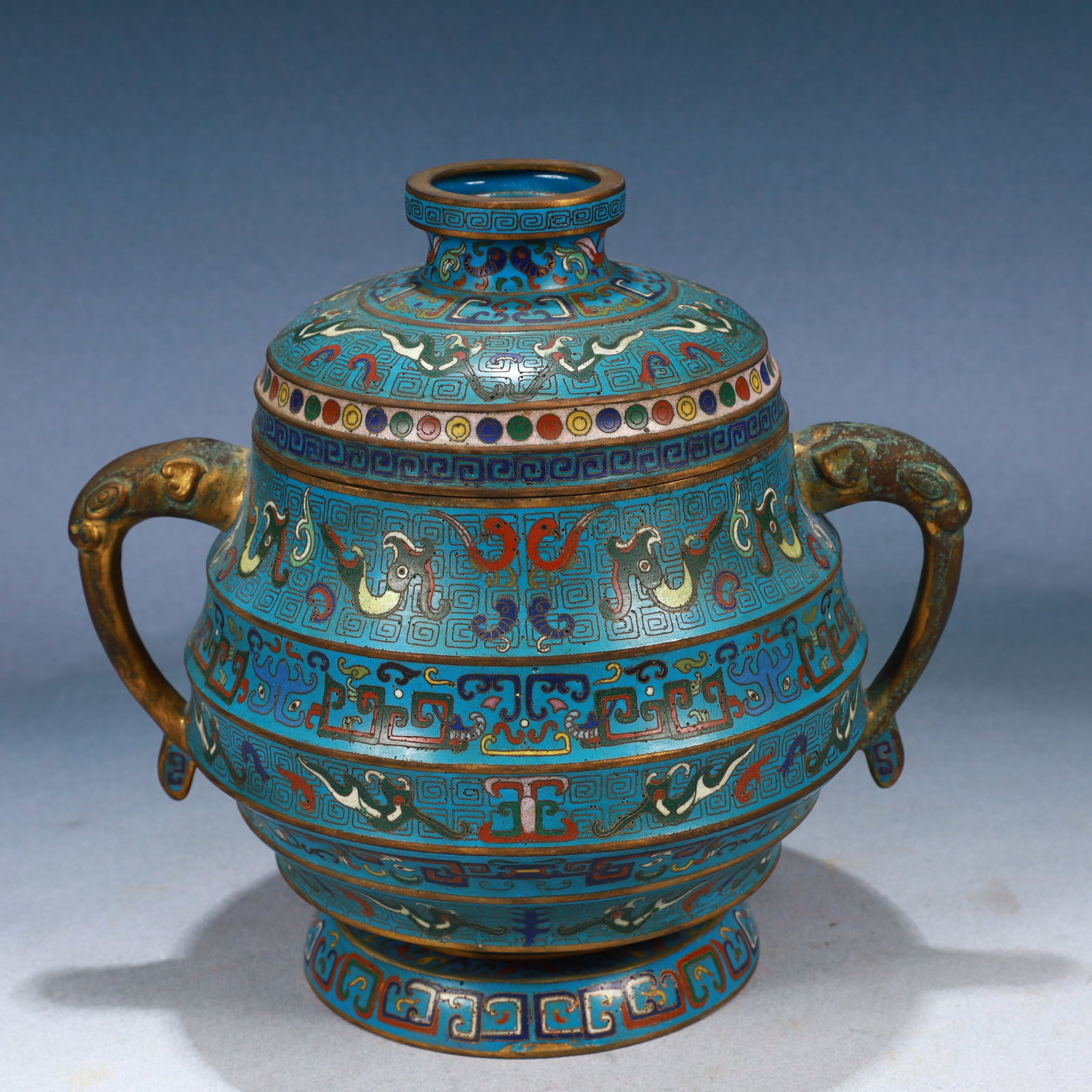 An Exquisite Cloisonne Beast-Face Pattern Beast-Ears Cover Jar: An Exquisite Cloisonne Beast-Face Pattern Beast-Ears Cover Jar,Qing Dynasty, China,Qianlong Four-character Mark,Size:10.2inx7.9inx9.4in,Weight:3350g 景泰蓝兽面纹