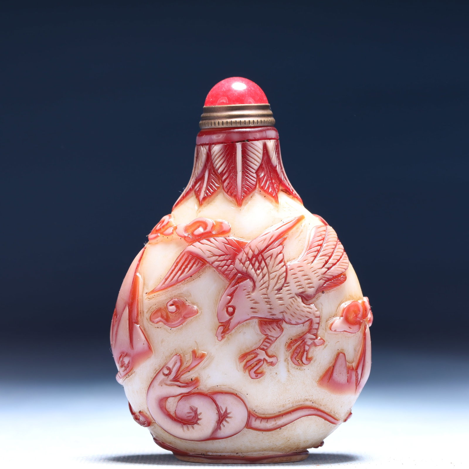 An Exquisite Glass Auspicious Cloud and Crane Pattern Snuff Bottle: An Exquisite Glass Auspicious Cloud and Crane Pattern Snuff Bottle,Qing Dynasty,China,Qianlong Four-character Mark,Size:2.4inx1.2inx3.3in,Weight:77g 琉璃祥云鹤纹