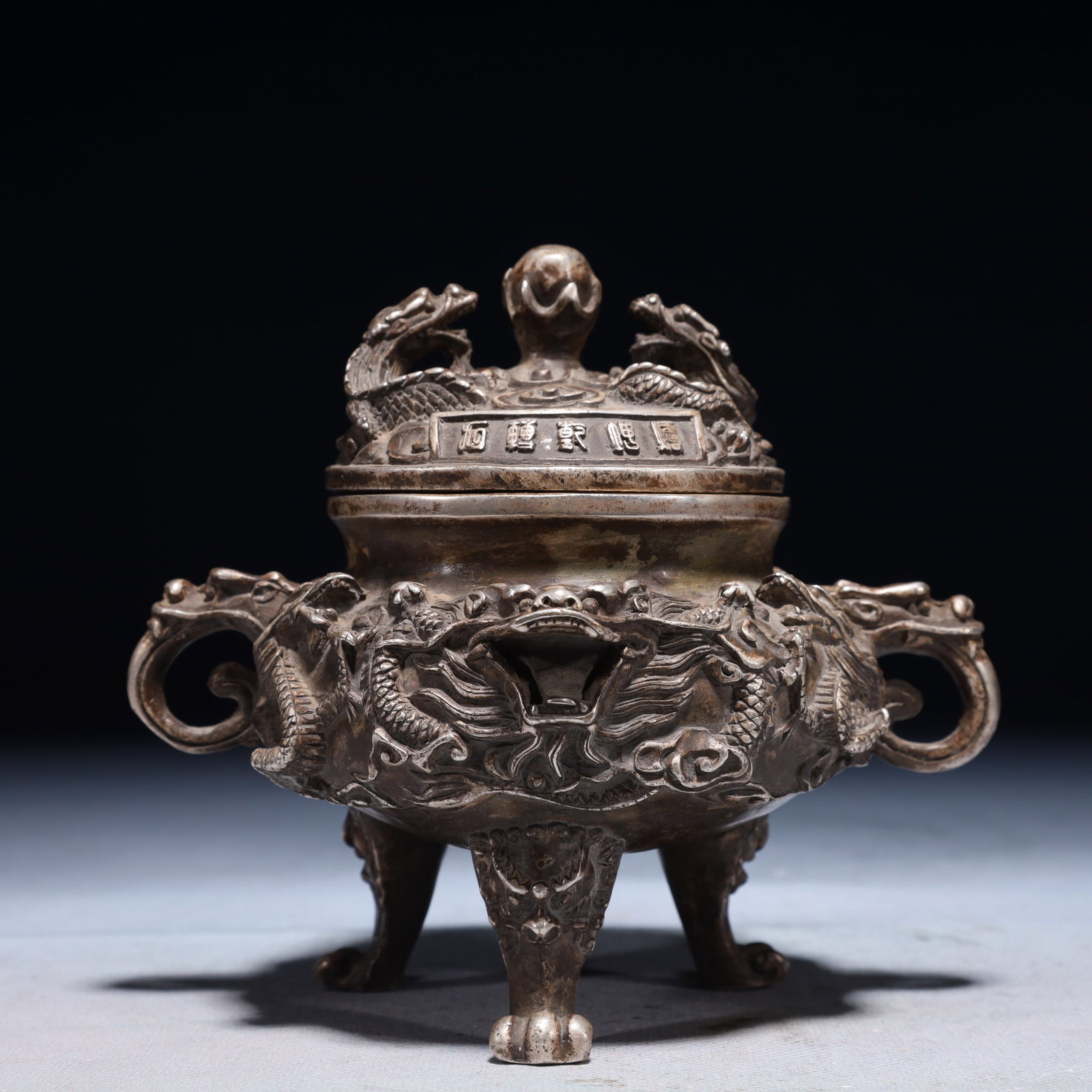 An Exquisite Silver-plated Bronze Auspicious Cloud and Dragon Pattern Beast-Ears Tripod Censer: An Exquisite Silver-plated Bronze Auspicious Cloud and Dragon Pattern Beast-Ears Tripod Censer,Qing Dynasty,China,Qianlong Four-character Mark,Size:5.9inx4.3inx5.1in,Weight:650g 铜镀໥