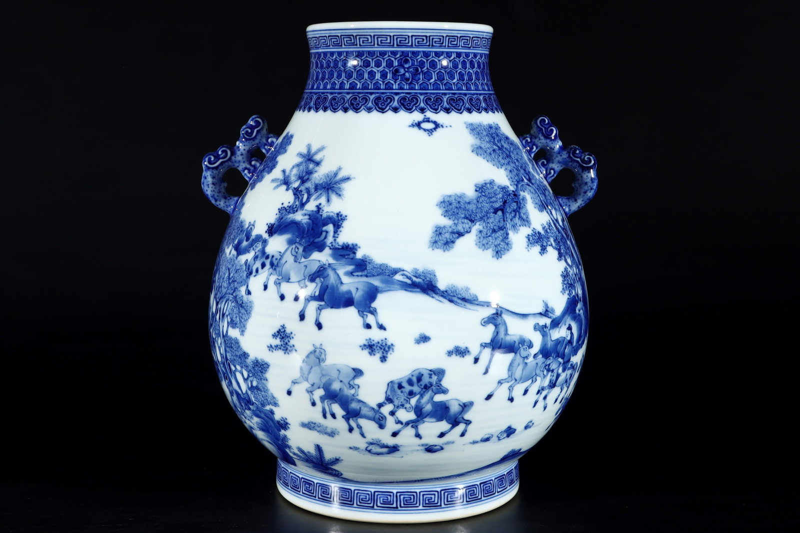 A Rare Blue and White Figure Riding Horse Pattern Double-Ears Vase: A Rare Blue and White Figure Riding Horse Pattern Double-Ears Vase,Qing Dynasty,China,Qianlong Six-character Mark,Size:13inx10.2in 青花人物骑马纹双ň