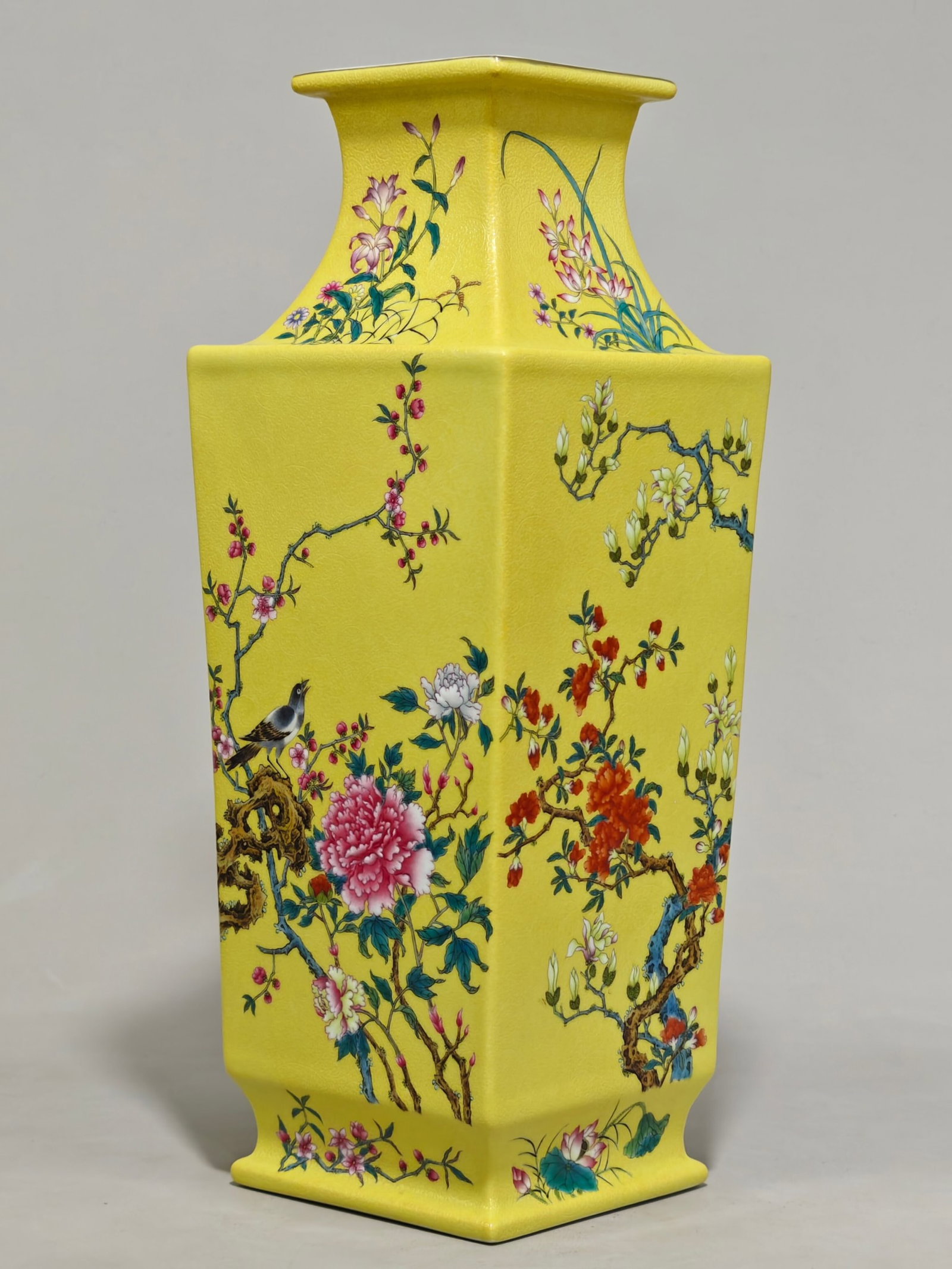 A Rare Yellow Ground Famille-Rose Flower and Bird Pattern Vase: A Rare Yellow Ground Famille-Rose Flower and Bird Pattern Vase,Qing Dynasty,China,Qianlong Six-character Mark,Size:15.7inx5.7in 黄地粉彩花鸟纹瓶中